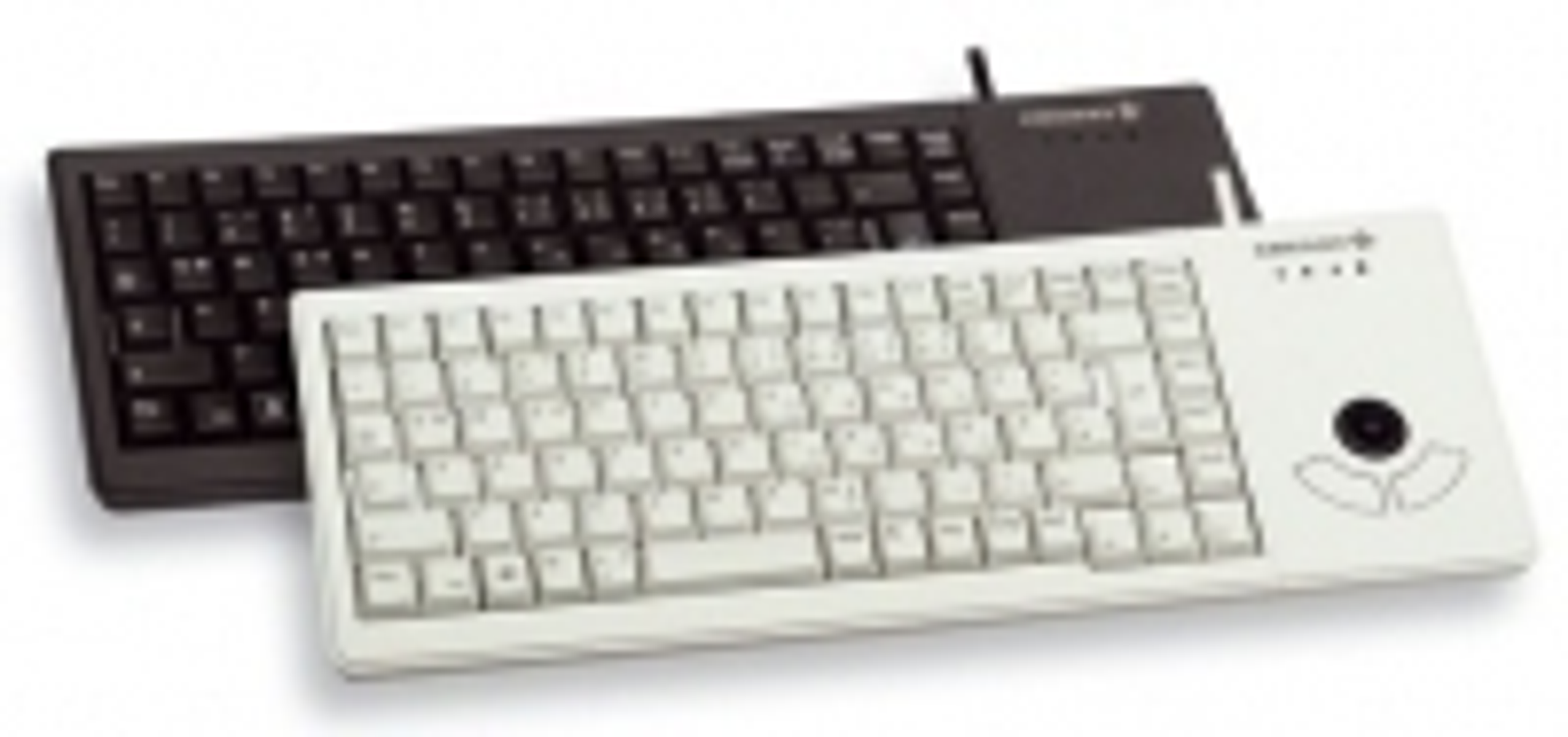 Due tastiere, una nera, una bianca, con trackball e pulsanti del mouse.