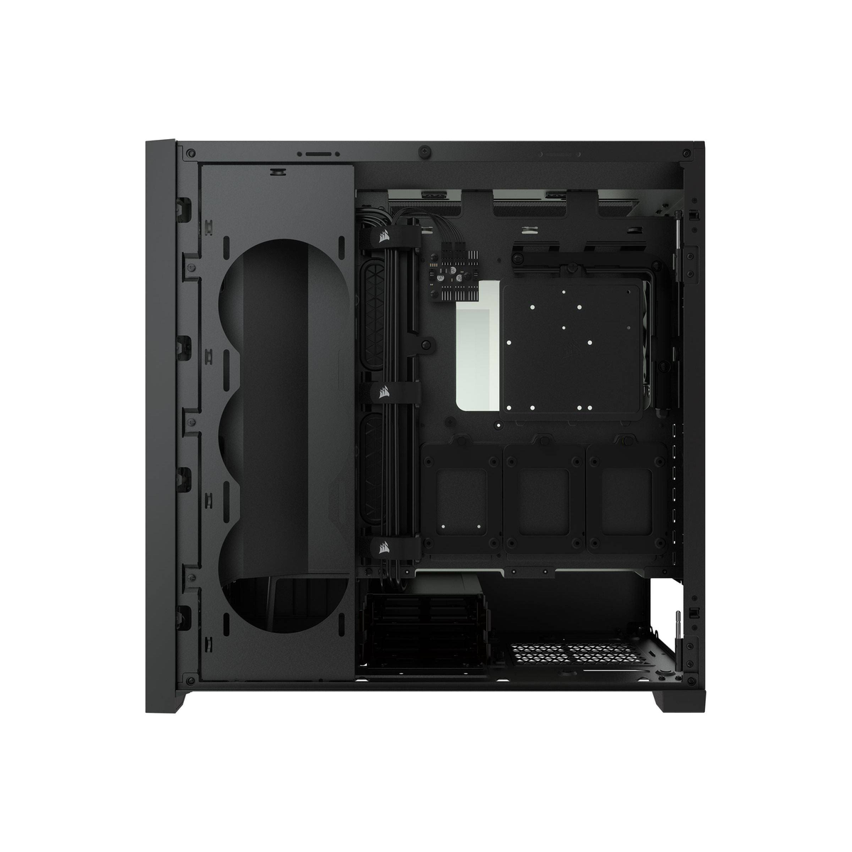 Vista interior de una caja de computadora negra con componentes y áreas de montaje.