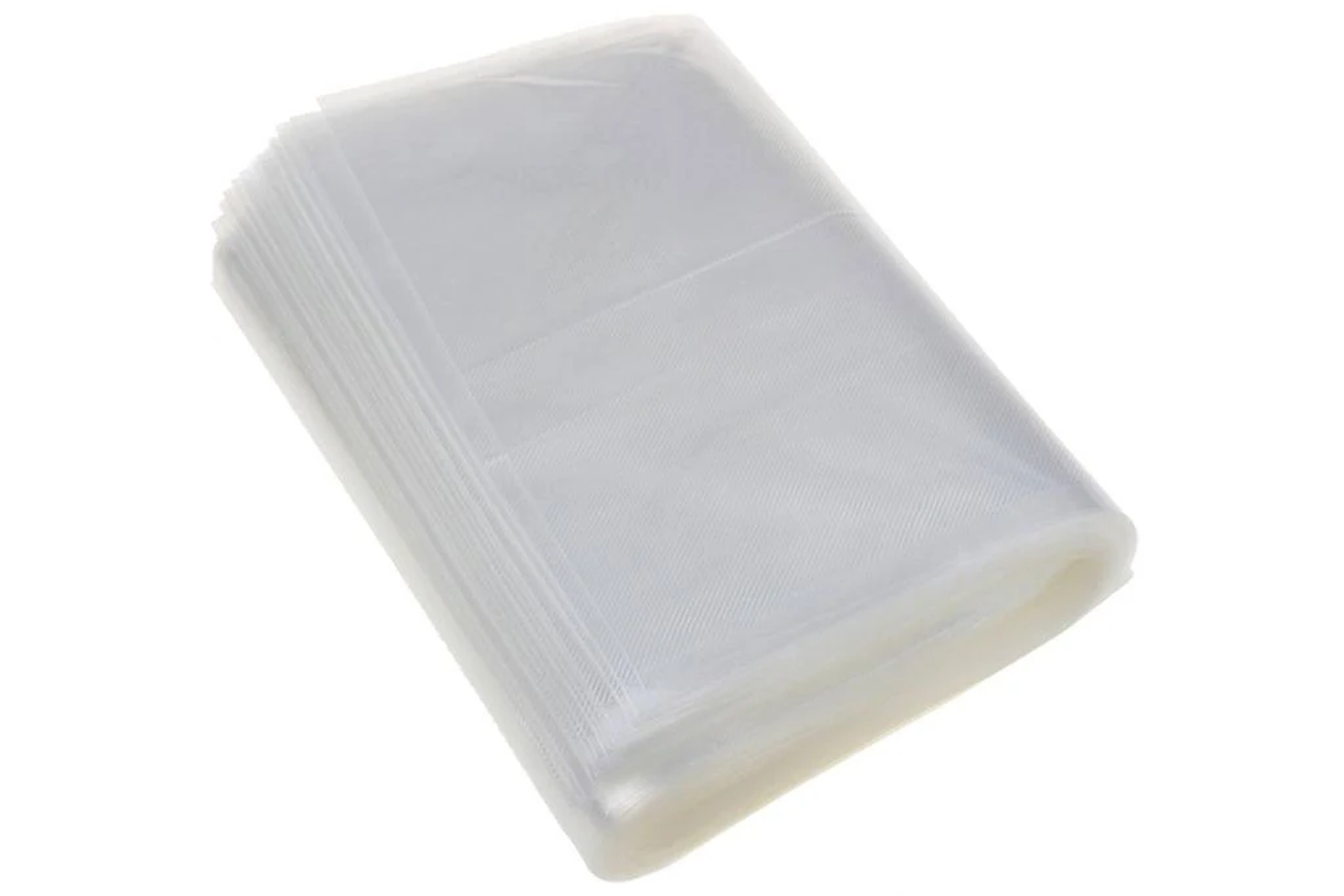 Stapel klarer Kunststofffolien, möglicherweise für Verpackungen, auf weißem Hintergrund.