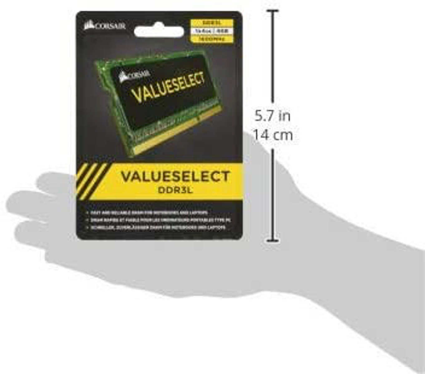 Kość RAM w opakowaniu, dłoń trzymająca opakowanie.