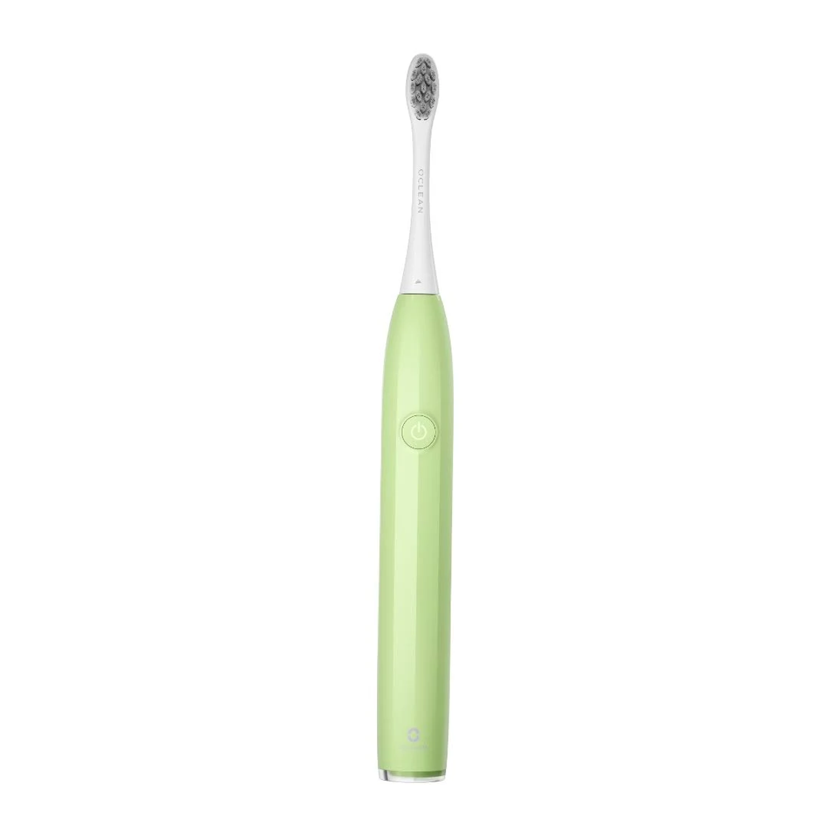 Uno spazzolino elettrico verde con testina bianca su sfondo bianco.