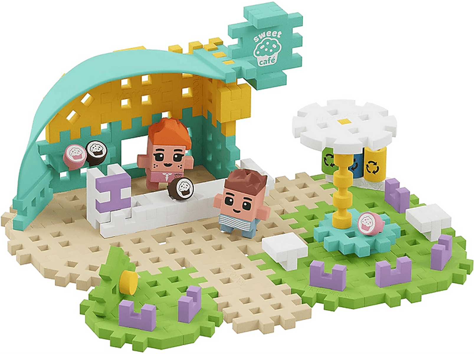 Ein Lego-ähnliches süßes Café-Set mit zwei Lego-Figuren und einem blütenförmigen Tisch.