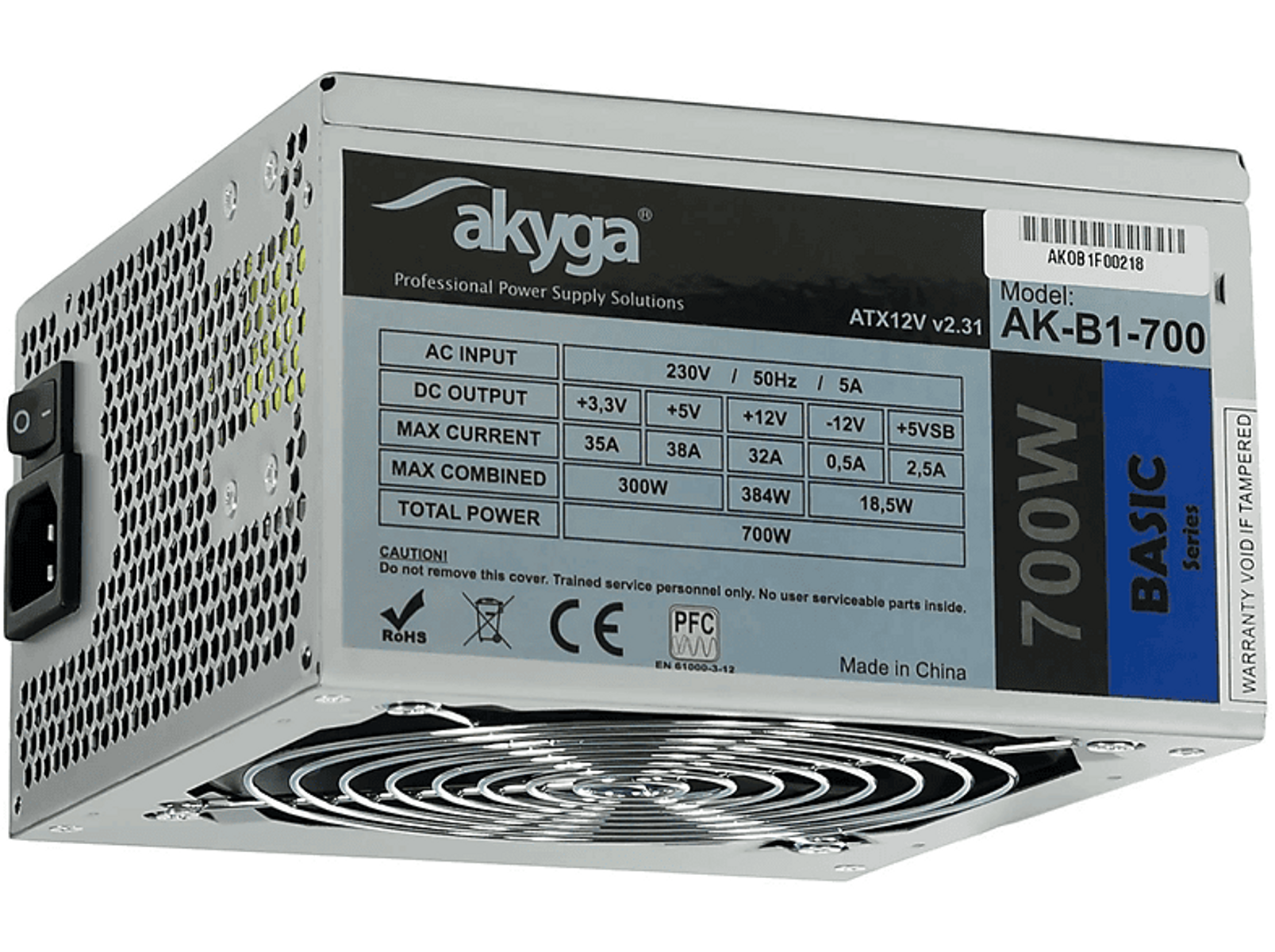 Zasilacz Akyga 700W Basic. Jest szary i ma duży wentylator na spodzie.