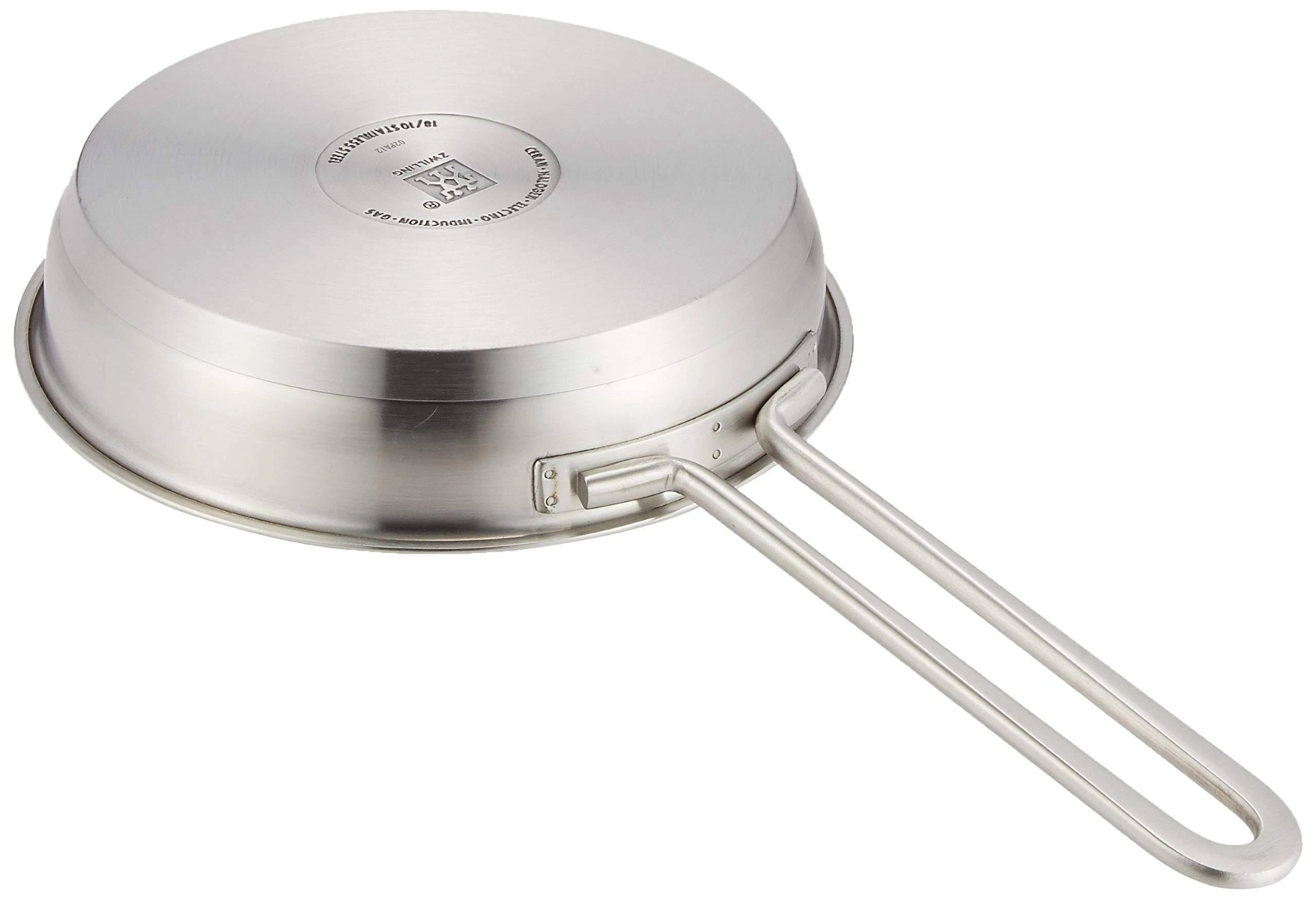 Patelnia ze stali nierdzewnej, z uchwytem, na białym tle, widok od spodu.