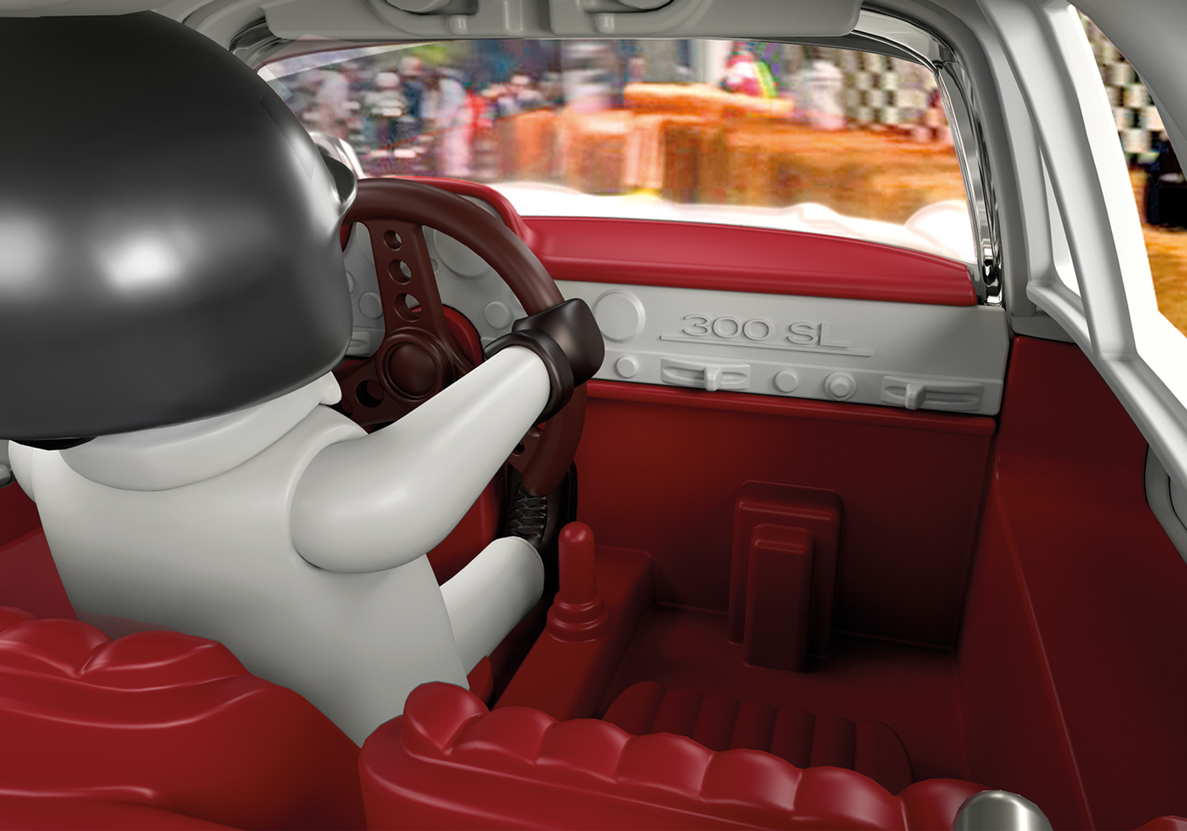 Un personaggio giocattolo in una macchina da corsa, mani sul volante, interno rosso e bianco.