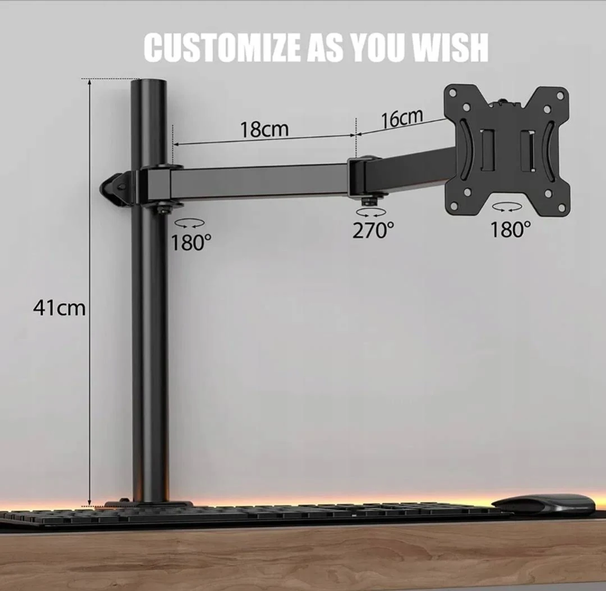 Support d'écran noir avec dimensions et angles de rotation, contre un mur clair avec un bureau.