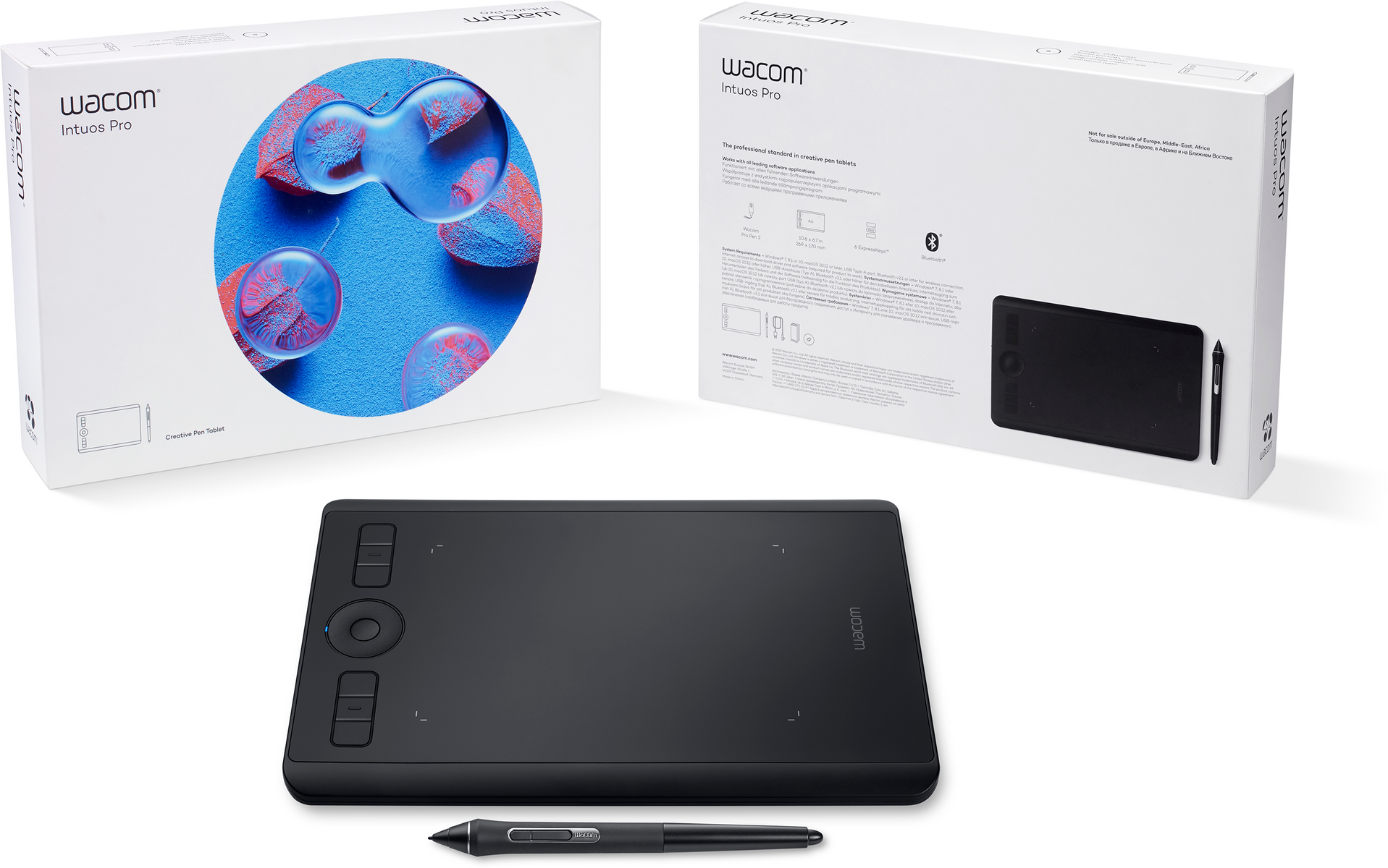 Wacom Intuos Pro Grafiktablett und Stift. Kartons im Hintergrund. Weißer Hintergrund.