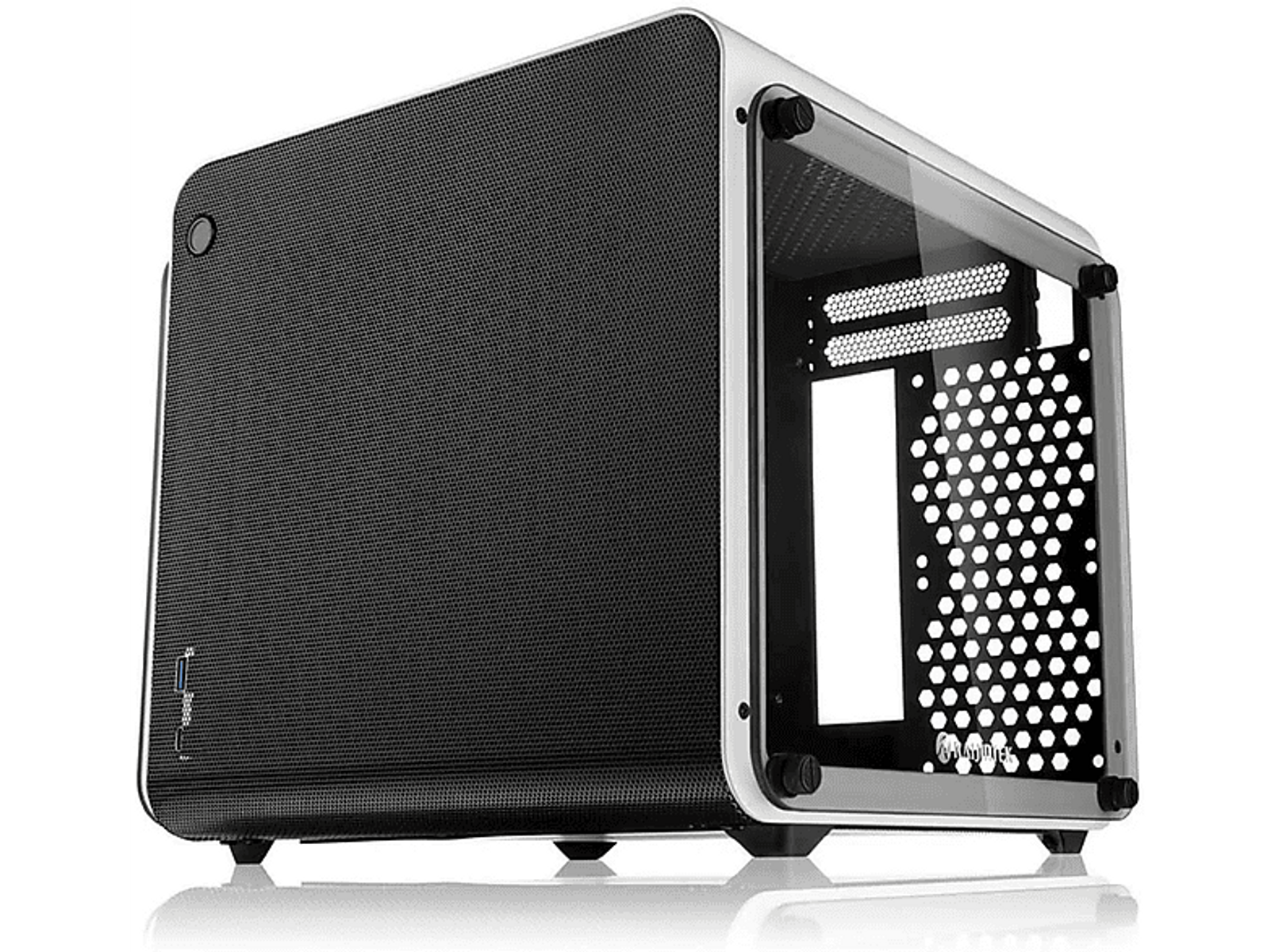 Black and silver computer case. Glass side panel. Honeycomb back panel. Small form factor.