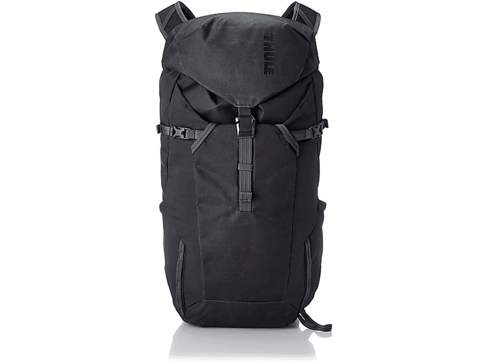 Ein schwarzer Thule-Rucksack auf schwarzem Hintergrund.
