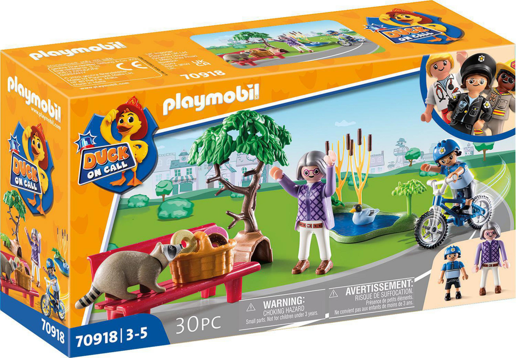 Scatola Playmobil con una scena di parco con un procione, una donna e bambini in bici.