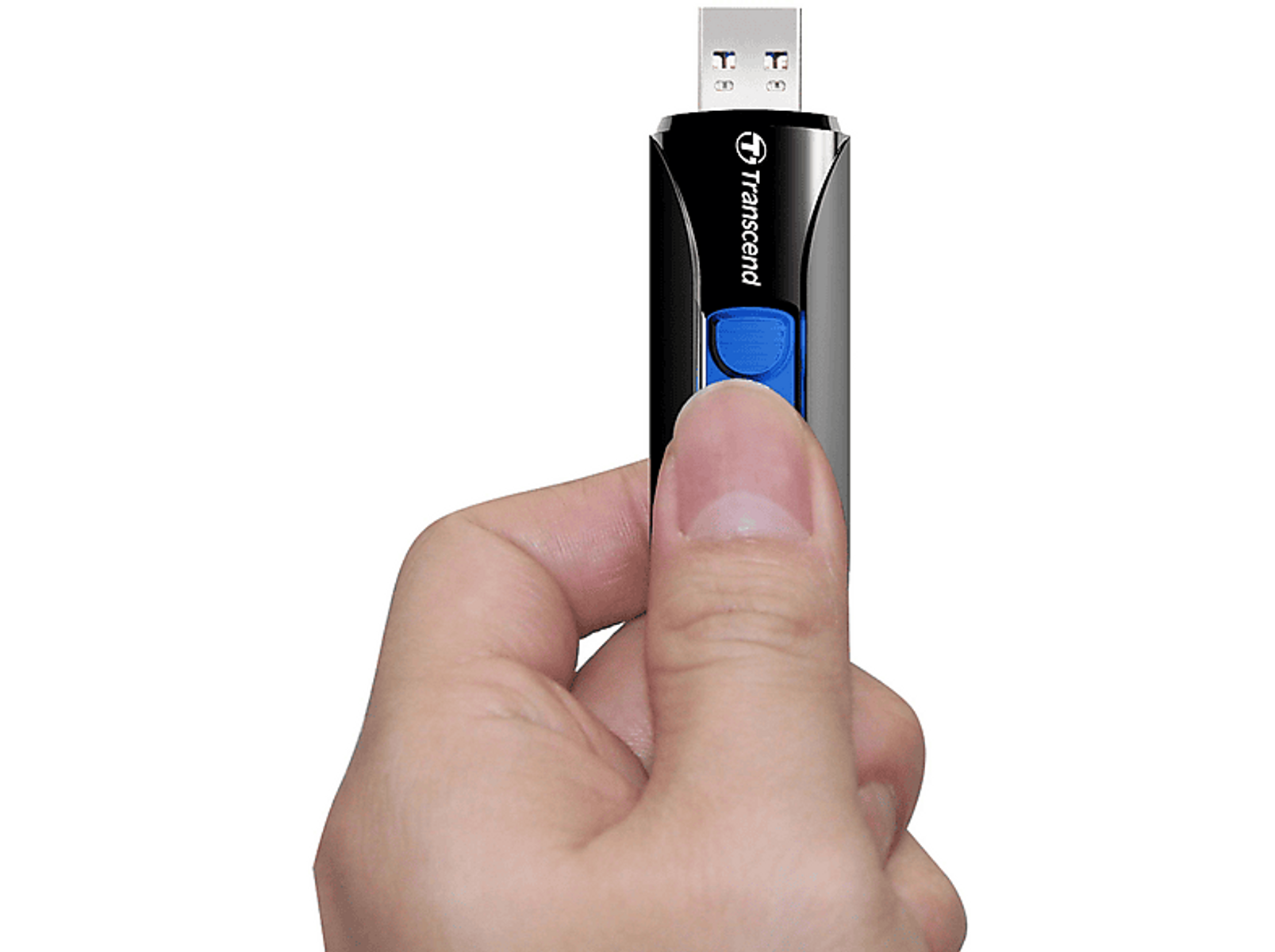 Ręka trzyma czarno-niebieski pendrive USB. Dysk ma przycisk.