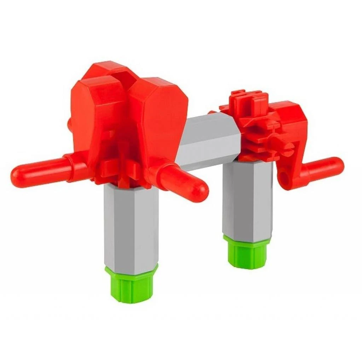 Ein rotes und graues Plastikspielzeug mit Zahnrädern und Griffen. Es steht auf weißem Untergrund, isoliert auf weißem Hintergrund.