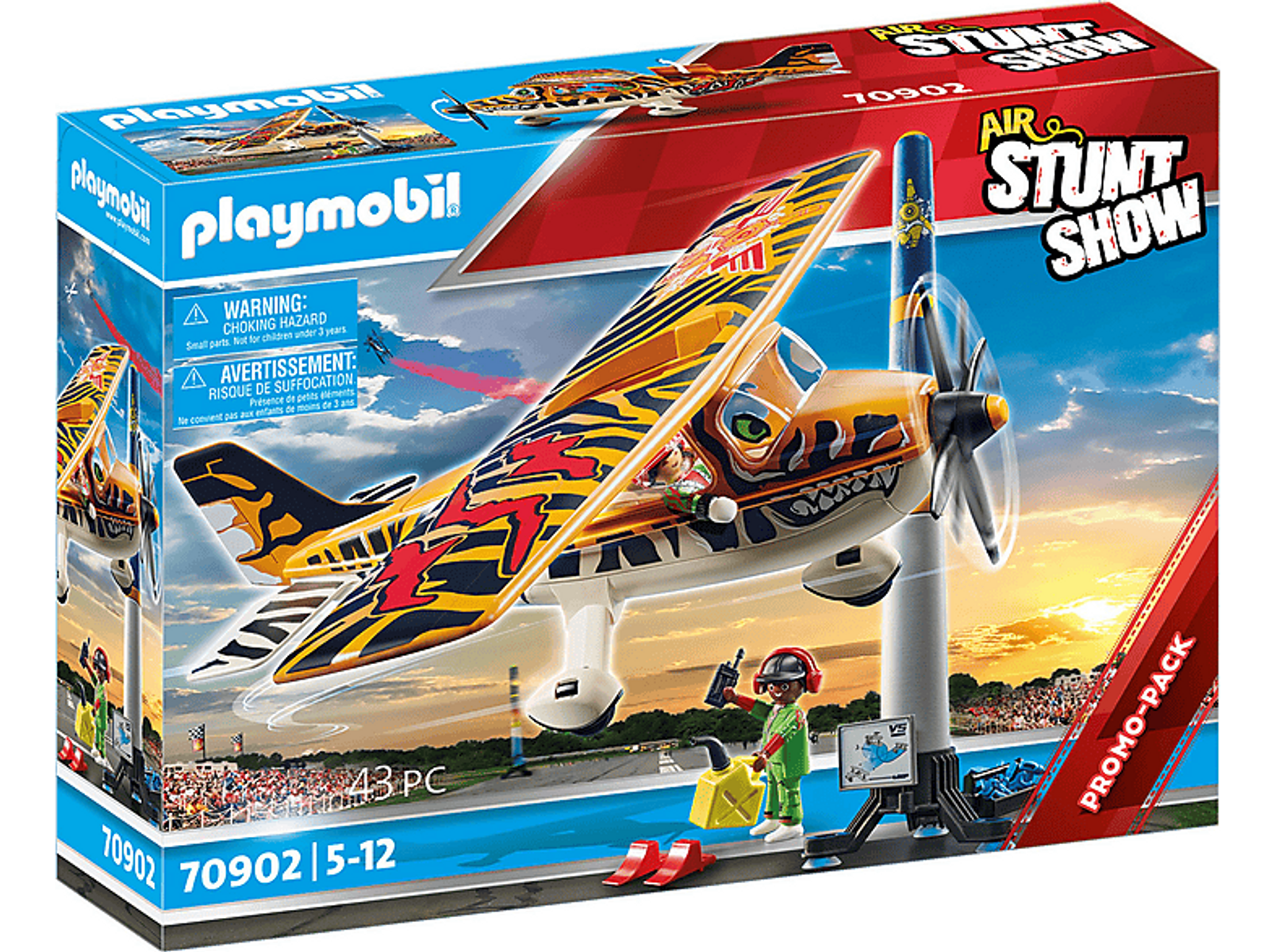 Playmobil-Spielzeugkiste mit einem gelb-roten Flugzeug auf der Vorderseite. Eine Figur steht neben dem Flugzeug.