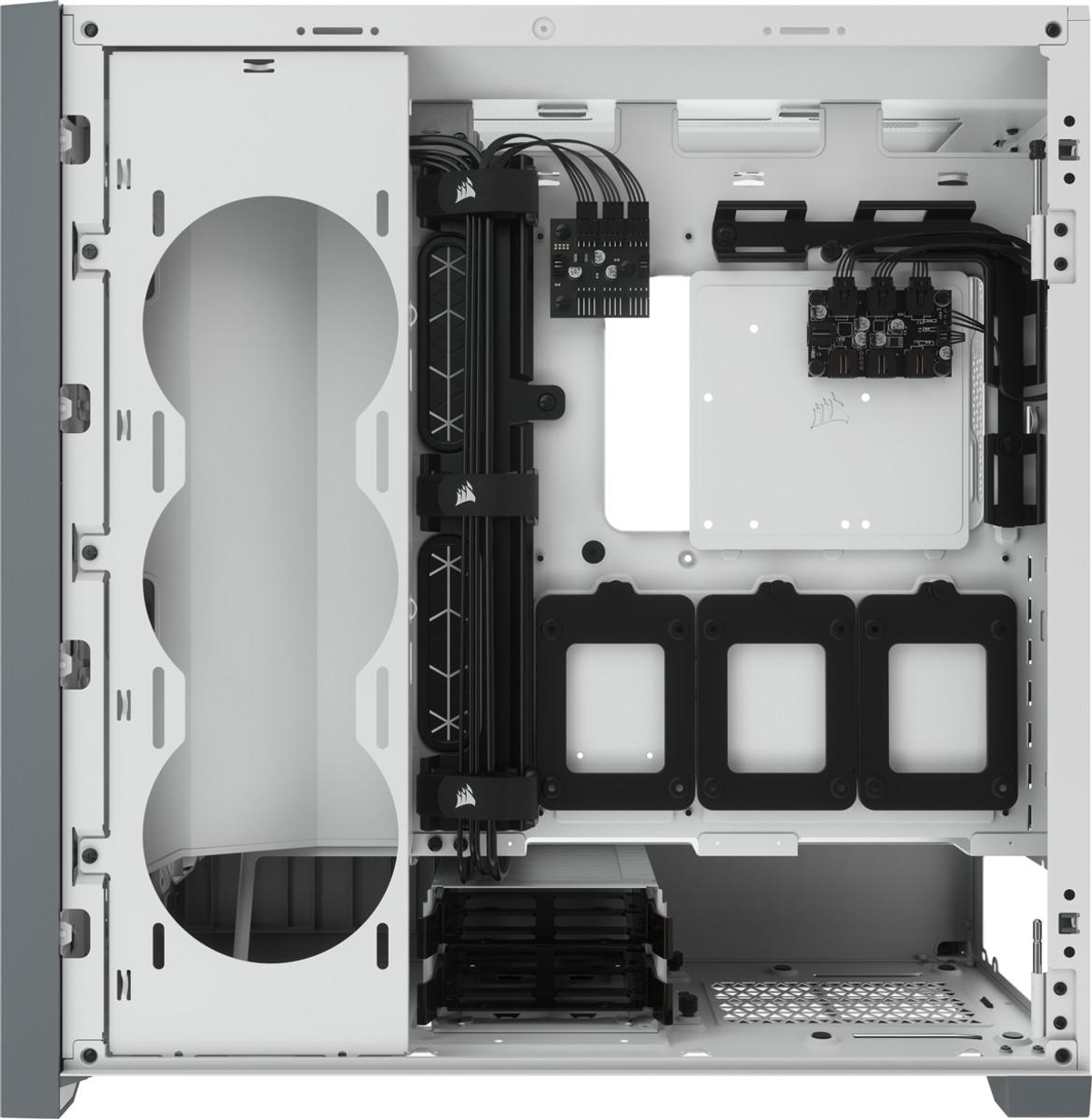 Otwarta obudowa komputera, z komponentami takimi jak wentylatory, wsporniki i przewody.