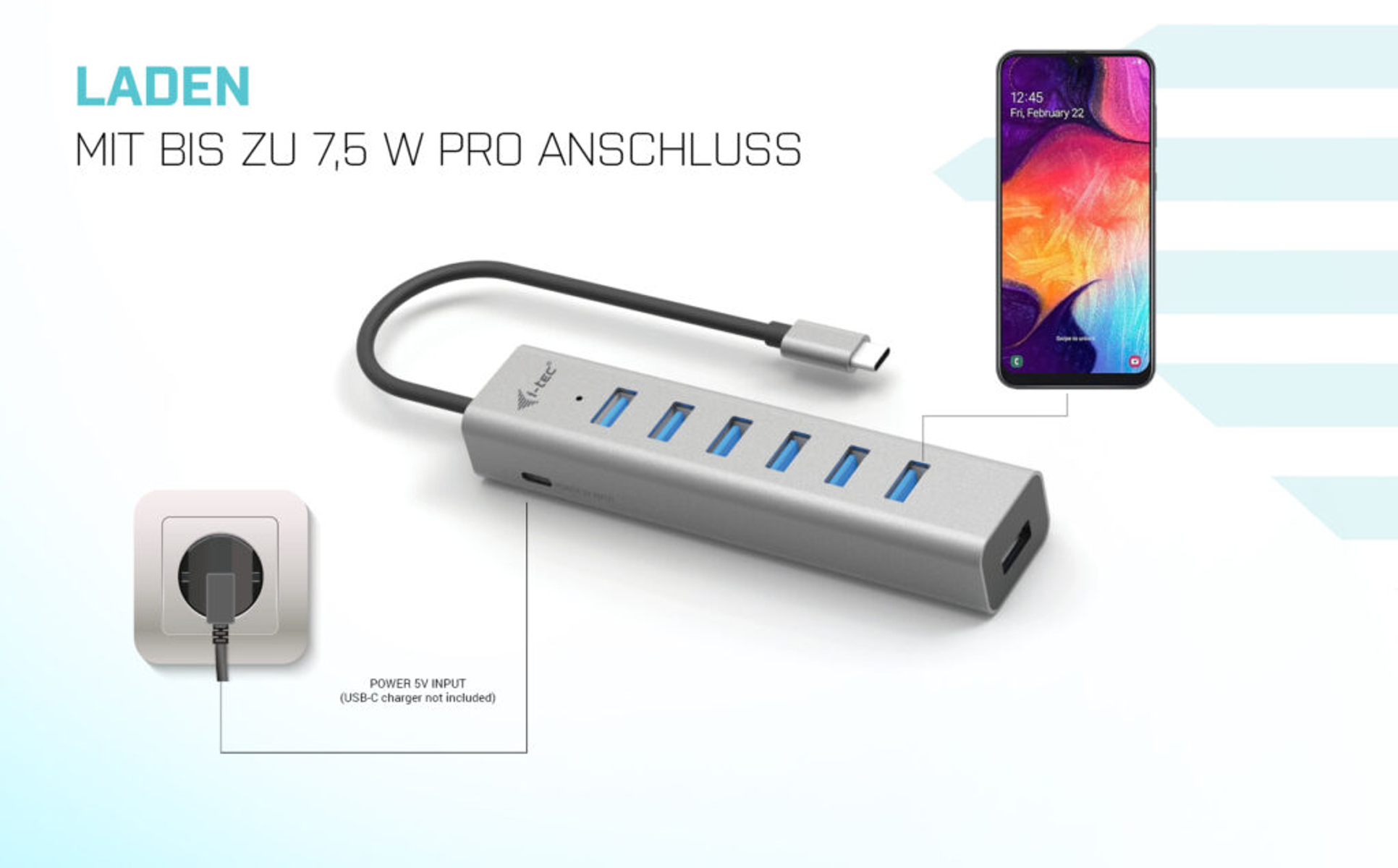 Hub USB argento collegato a un telefono e a una presa a muro.