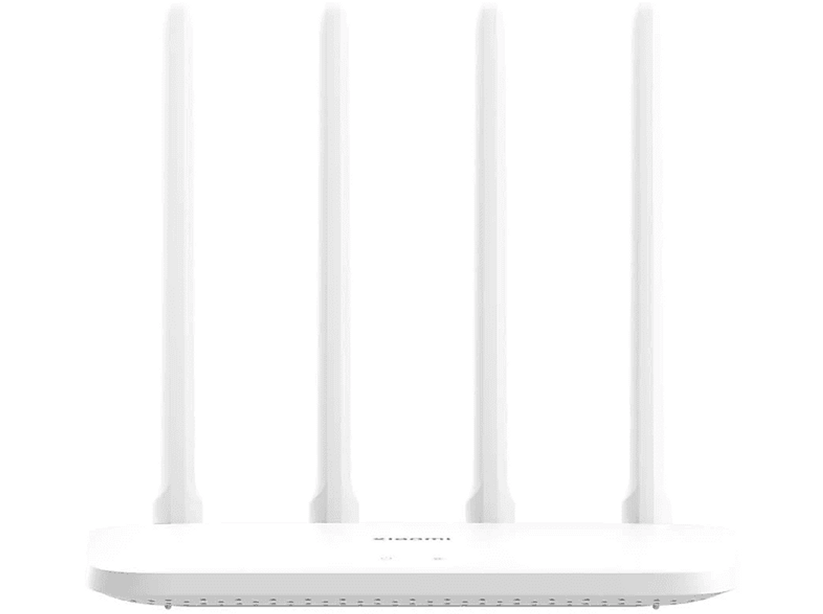 Biały router z czterema antenami na białej powierzchni, odizolowany na ciemnym tle.