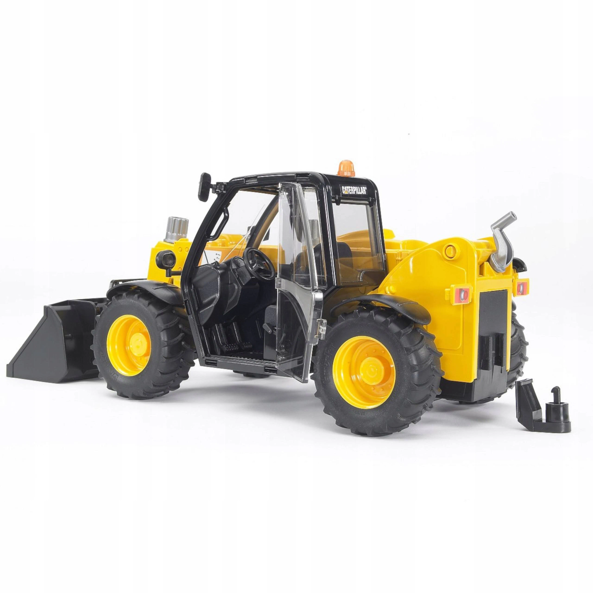 Żółty zabawkowy pojazd budowlany Caterpillar z czarnymi detalami, na białym tle.