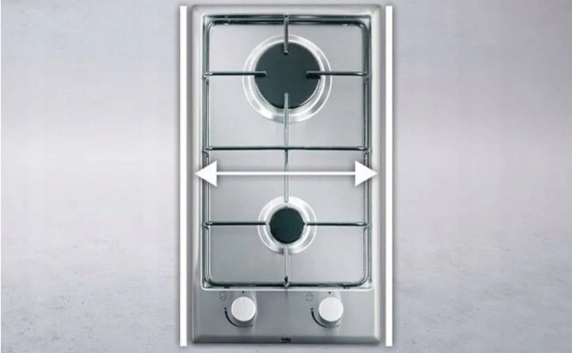 Encimera de gas de acero inoxidable con dos quemadores y mandos, vista superior.