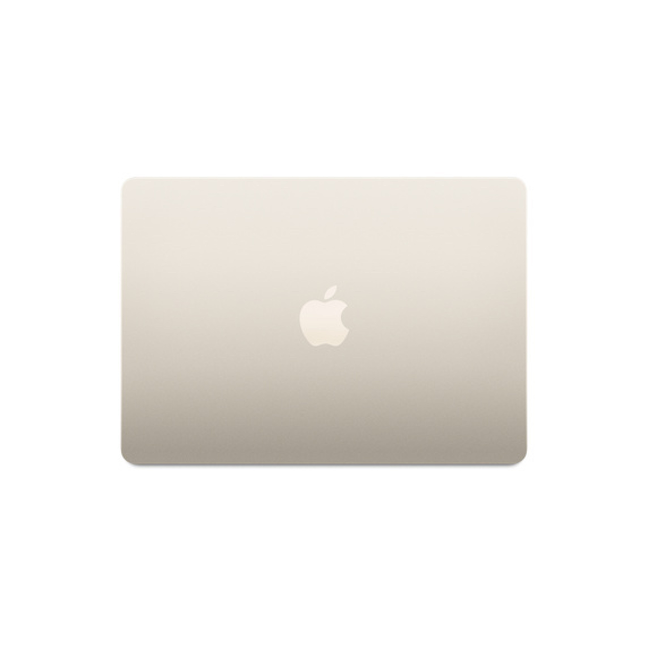 Un portátil cerrado, de color beige, con el logotipo de Apple.