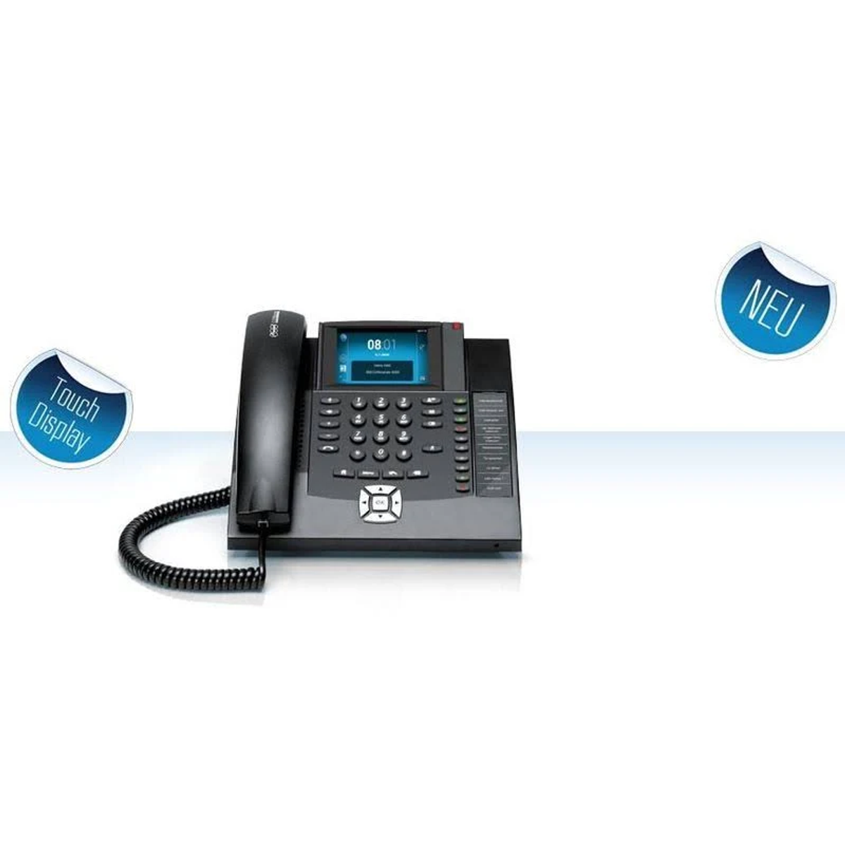 Ein schwarzes Bürotelefon mit Bildschirm und Tasten, mit Touch-Display und neuen Aufklebern.