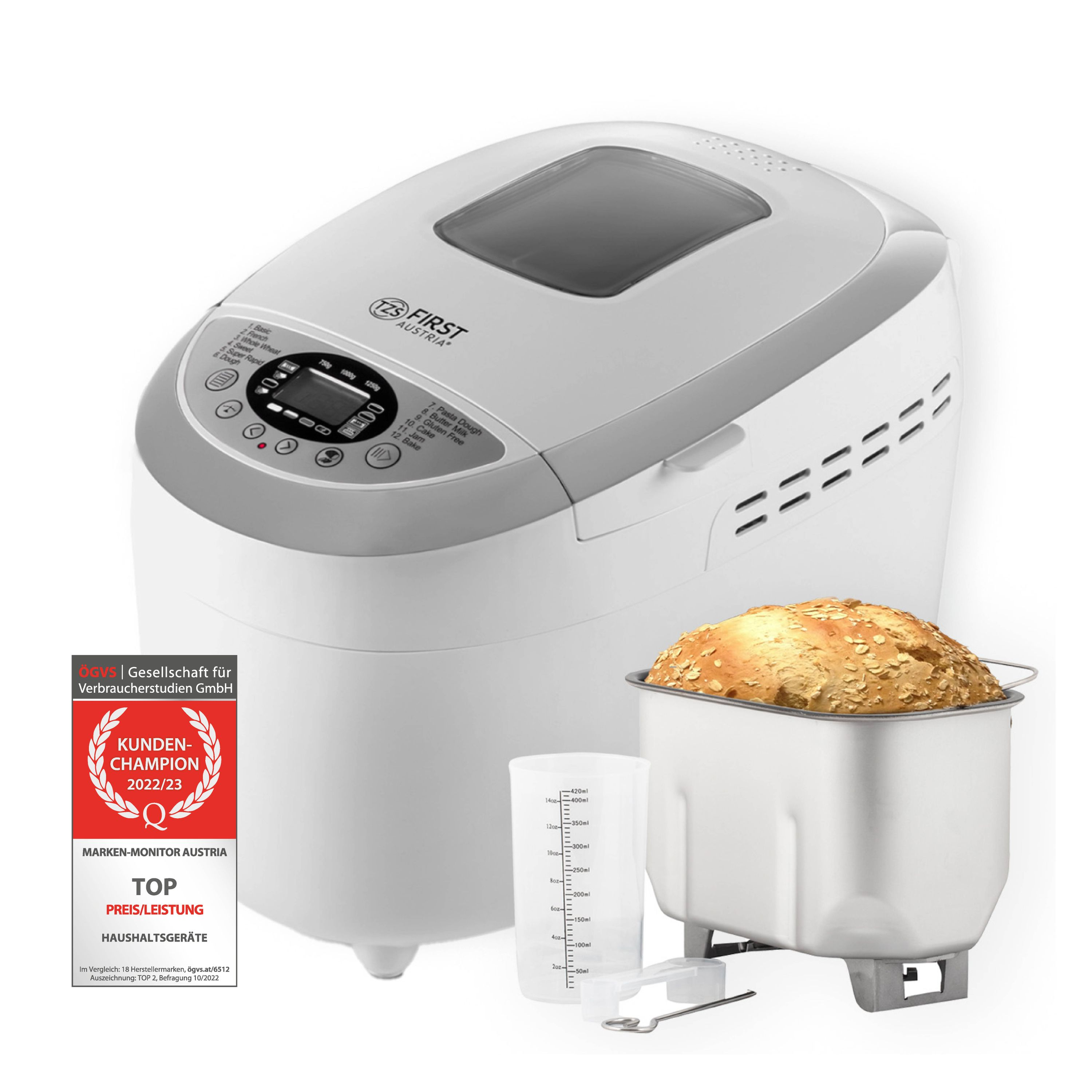 Weißer und grauer Brotbackautomat mit Brotlaib, Messbecher und Schöpfer. Text und Logo auf der Maschine.