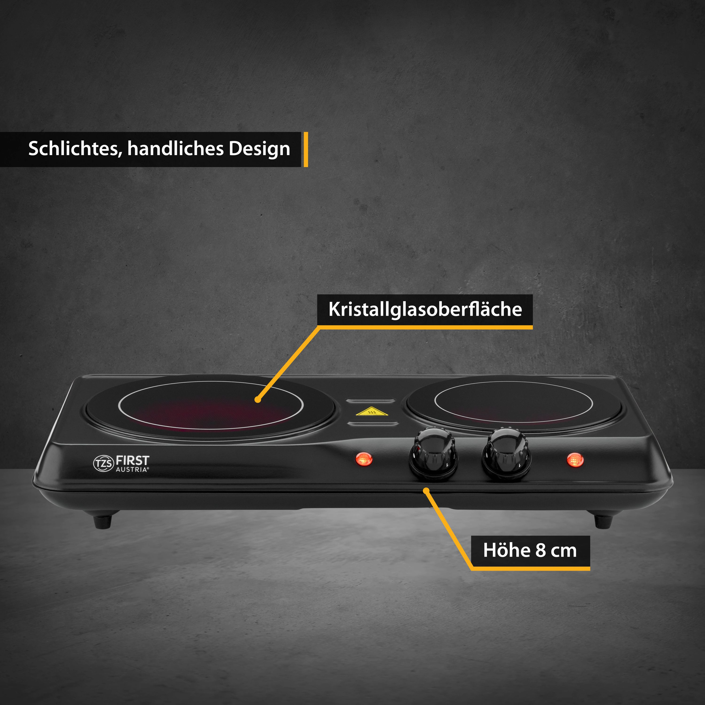 Schwarze Doppelkochplatte mit roten Heizelementen und Knöpfen.