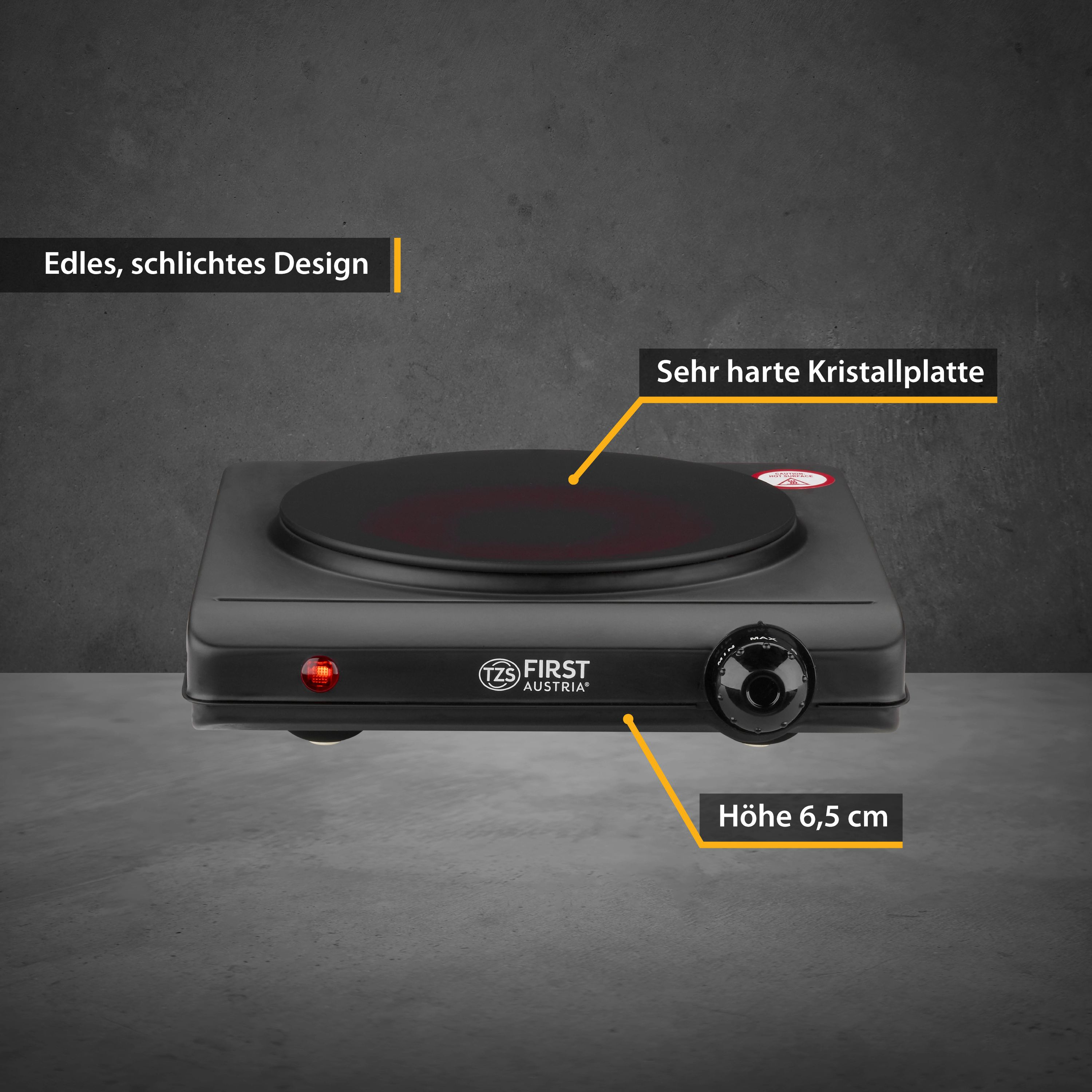 Eine schwarze First Austria Kochplatte. Ein rotes Licht ist an. Text sagt 'Edles, schlichtes Design' und 'Höhe 6,5 cm'.