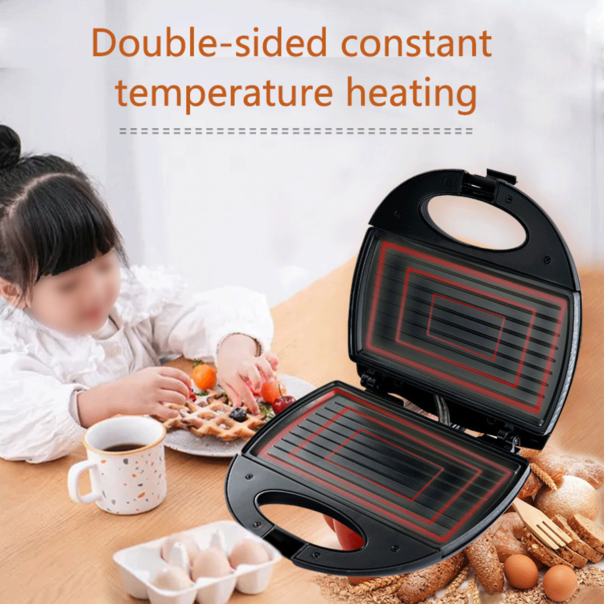 Ein schwarzer Sandwichmaker mit roten Heizplatten und einem Kind in der Nähe.