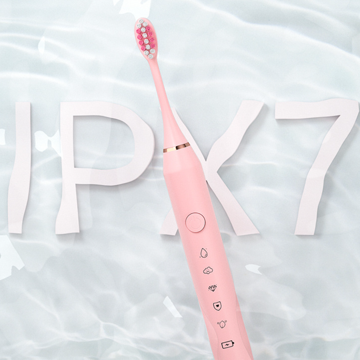 Rosa elektrische Zahnbürste mit IPX7-Bewertung. Die Buchstaben IPX7 sind im Hintergrund.