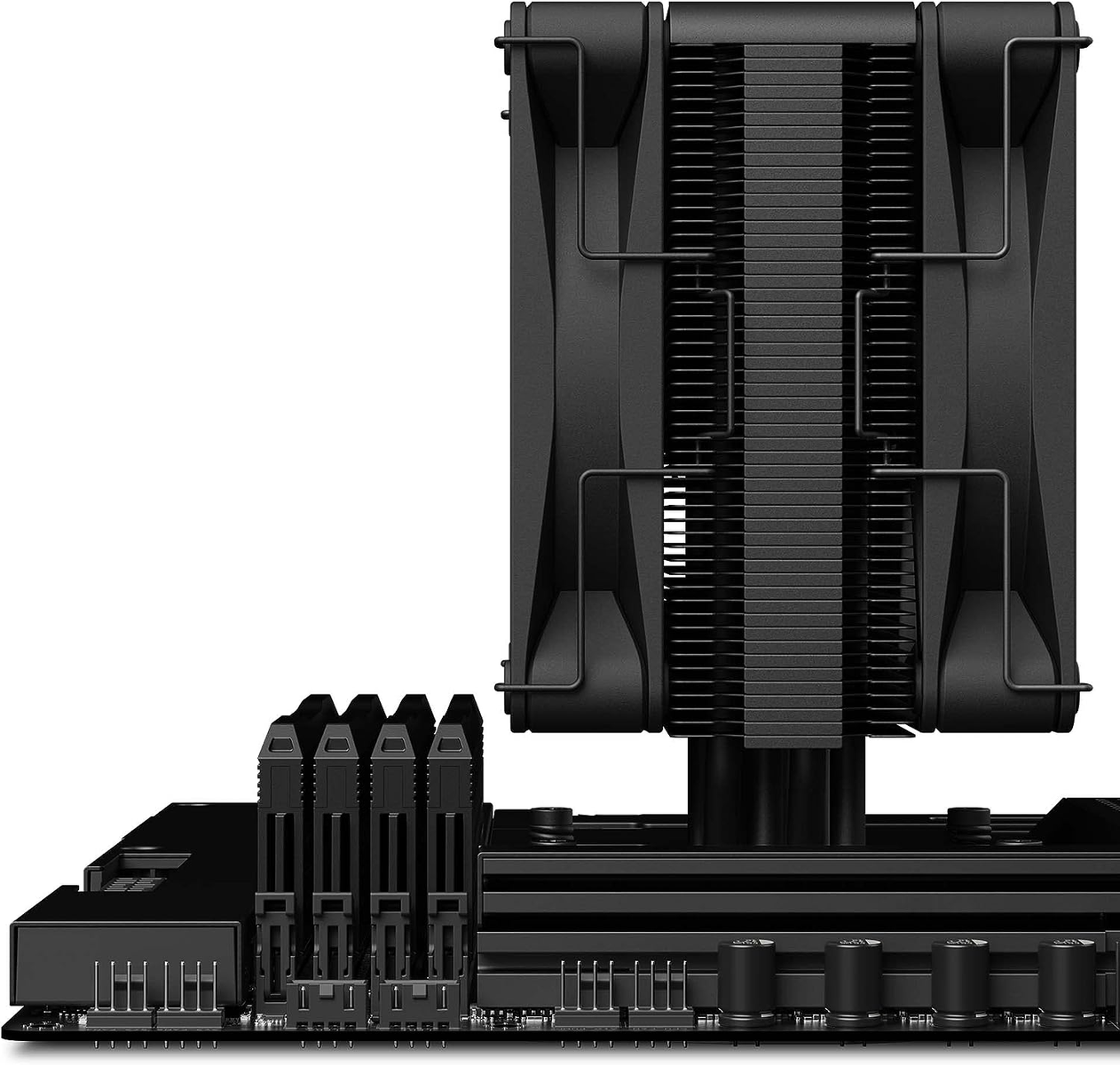 A black CPU cooler with a large heatsink and two fans on a black motherboard.