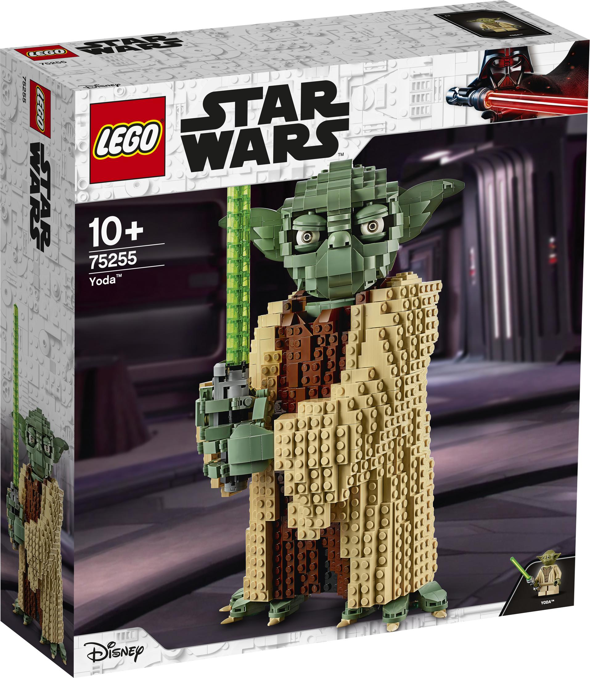 Lego Star Wars box. Yoda figure holding a green lightsaber. Darth Vader in the background.