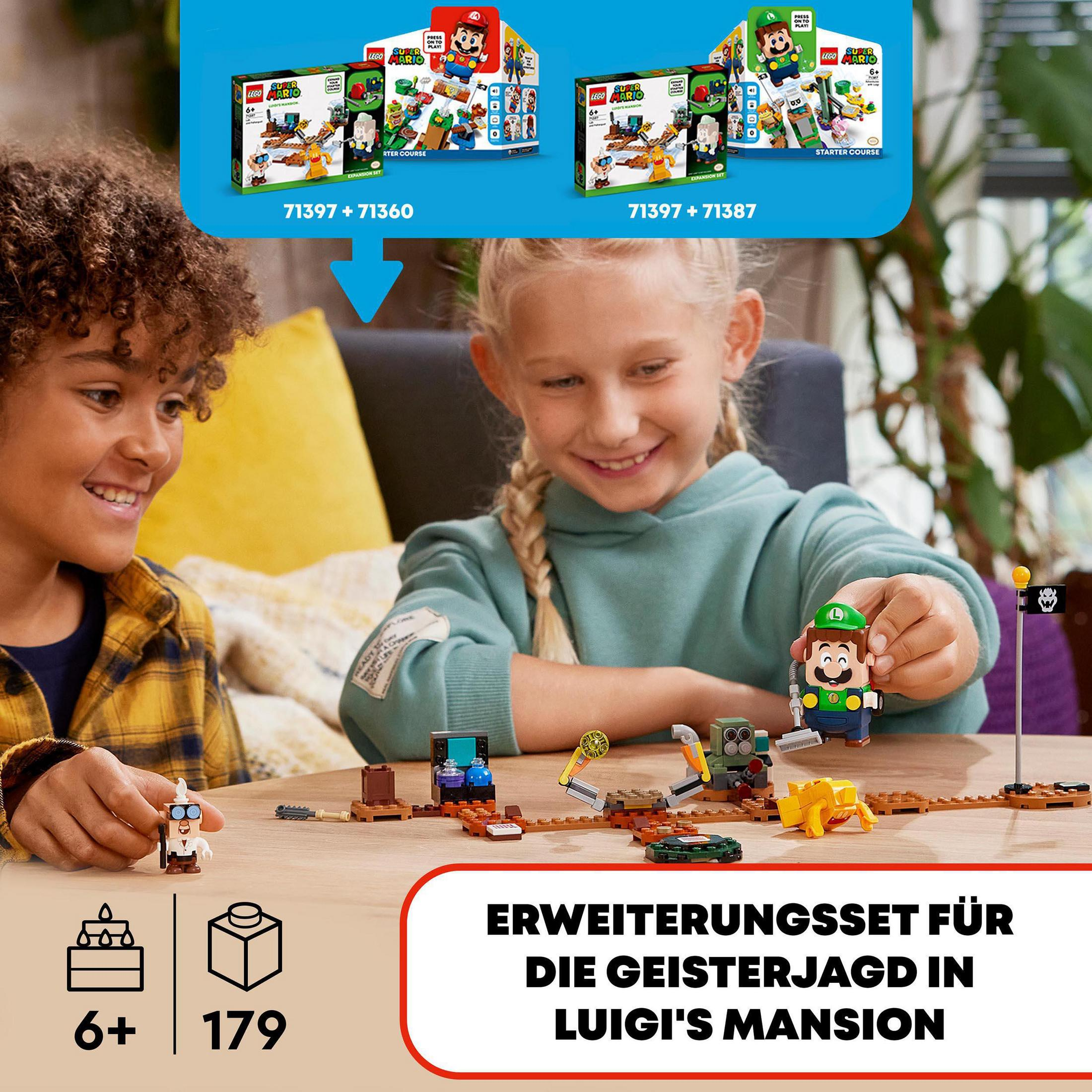 Kinder spielen mit Lego. Lego-Boxen im Hintergrund. Lego Luigi Figur.