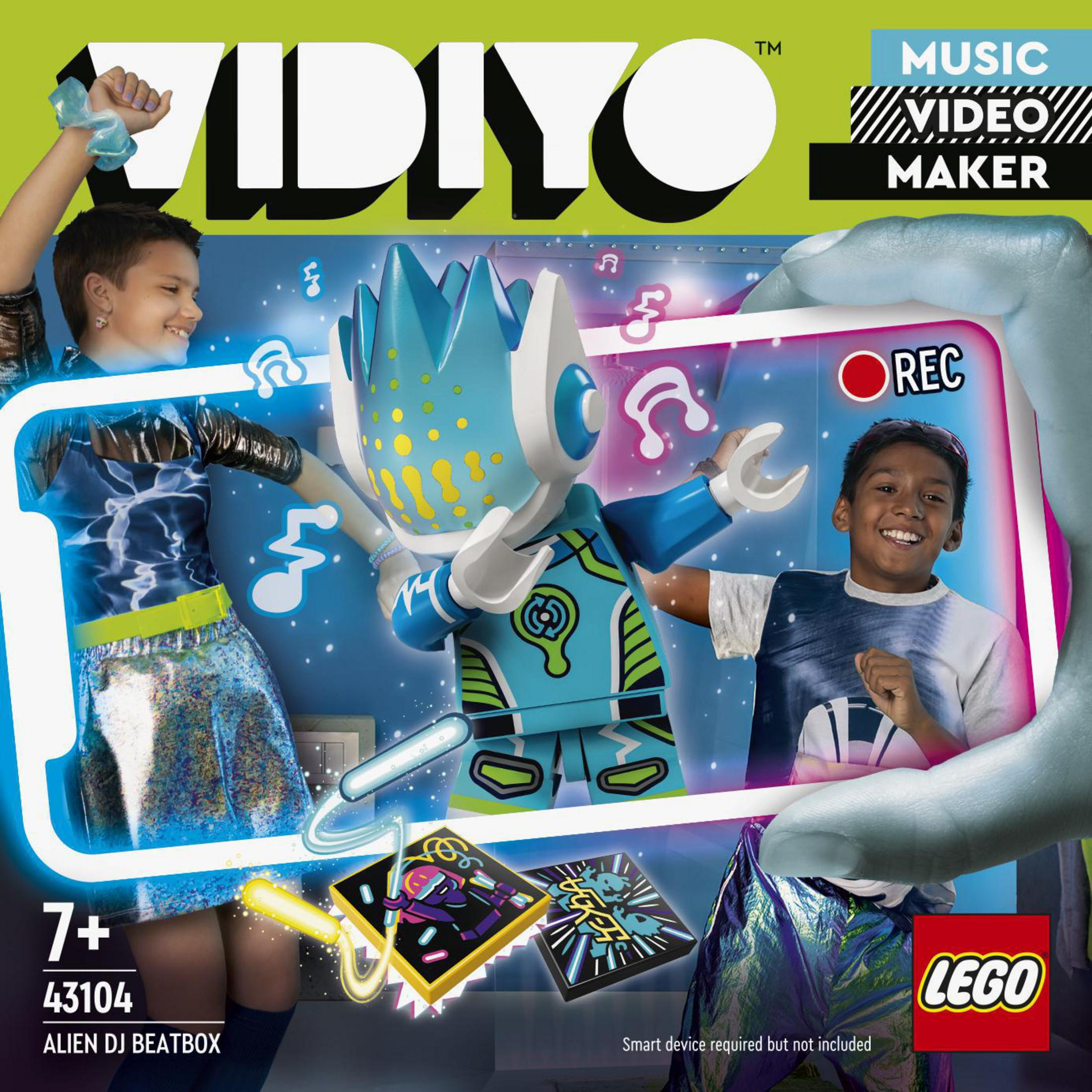 Lego-Box mit einer blauen DJ-Figur, zwei Kindern und Noten auf weißem Hintergrund.
