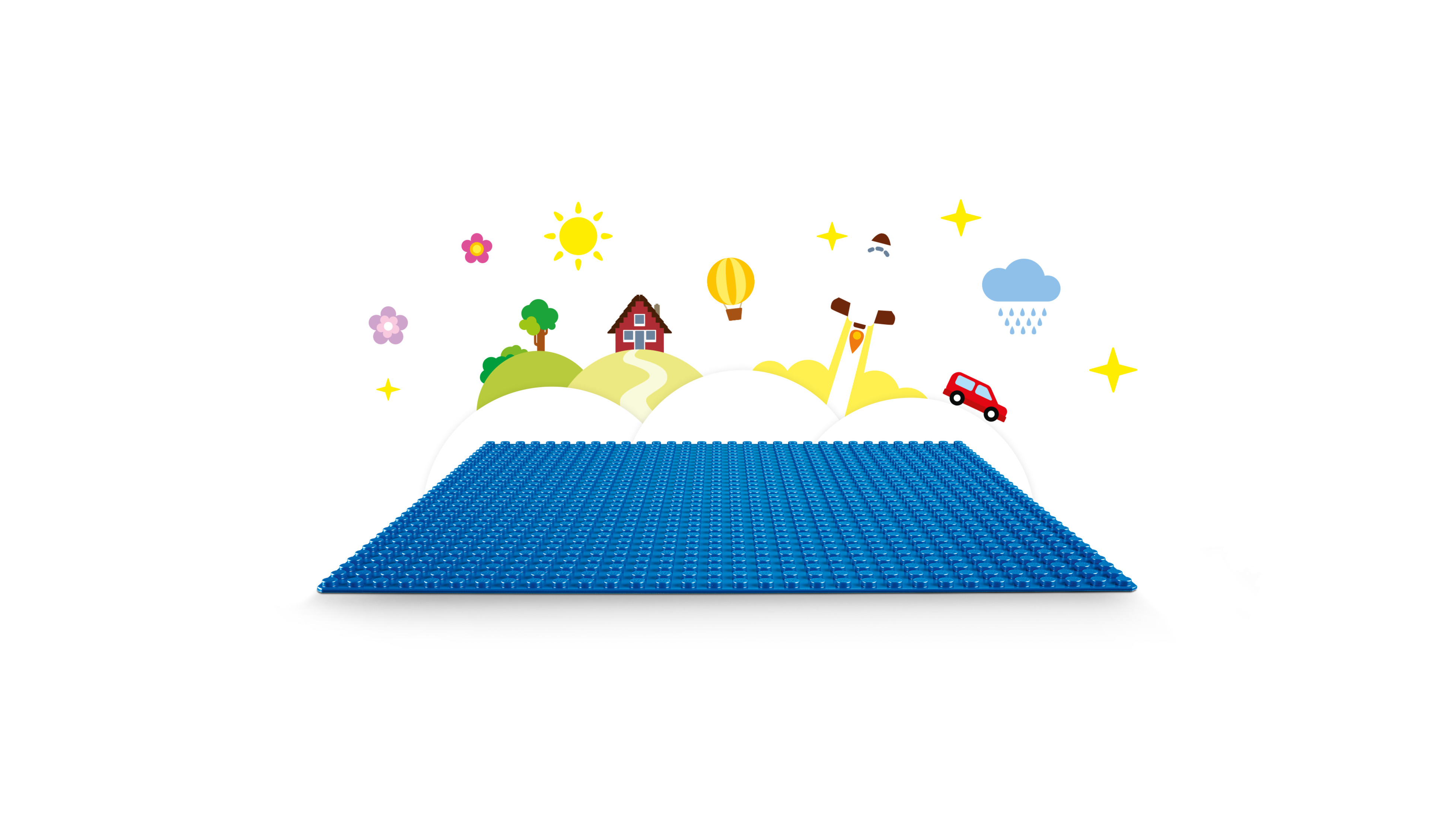 Niebieska podstawa Lego z kreskówkową sceną, w której znajduje się dom, słońce i samochód.