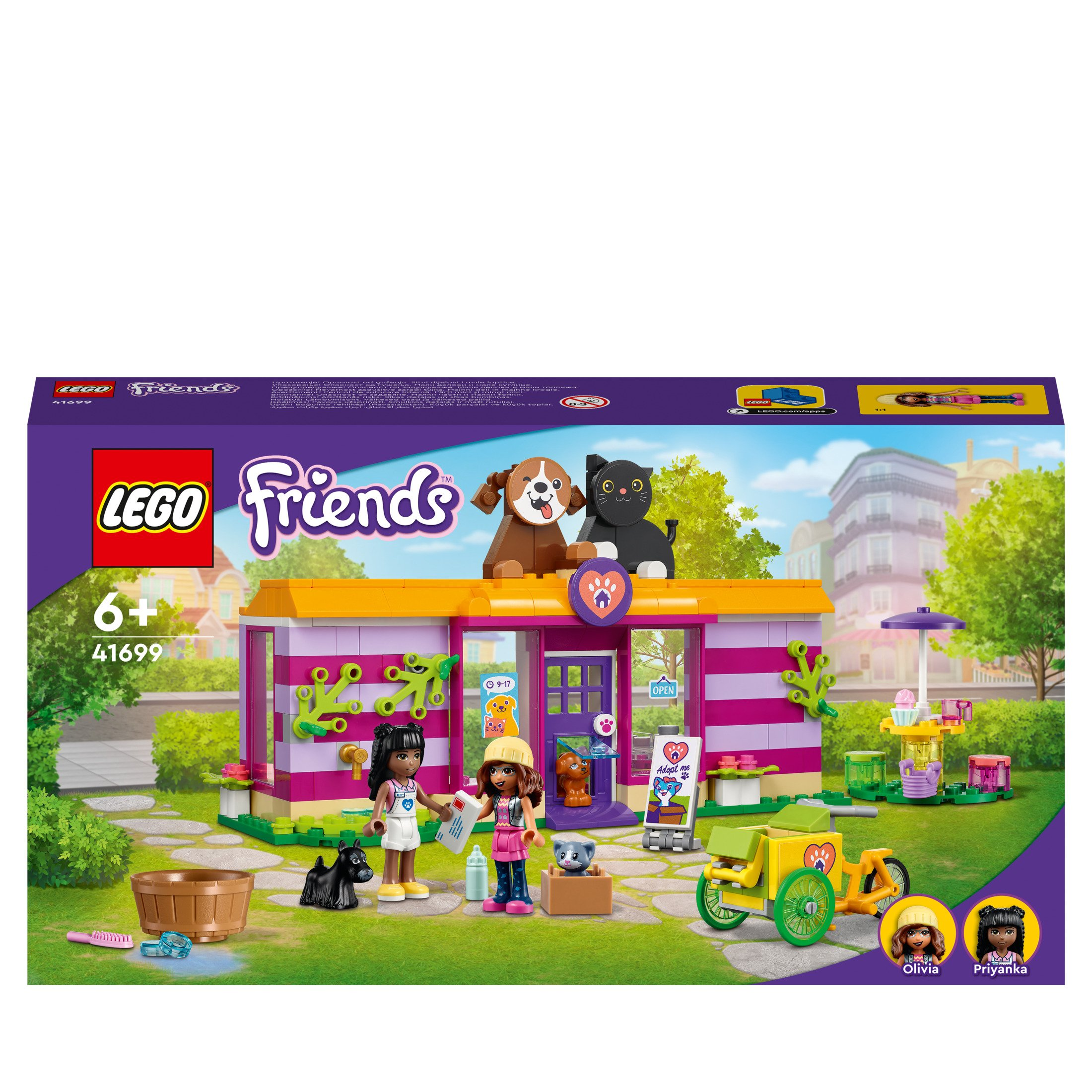 Lego Friends Box-Set mit einem Tiergeschäft, Figuren, Zubehör und einem Fahrrad.