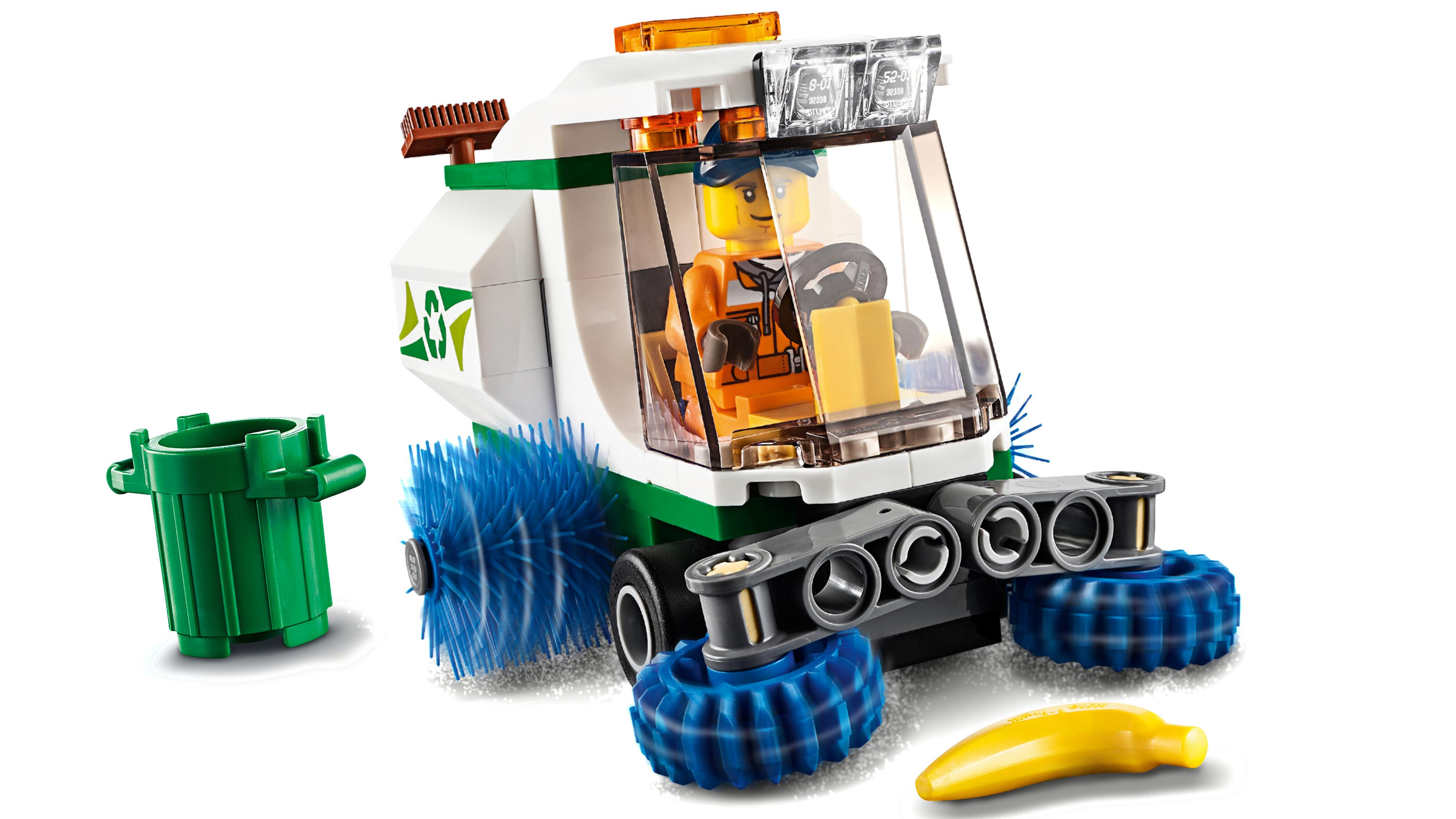 LEGO City Spielzeug-Straßenkehrmaschine mit Minifigur und Mülleimer.