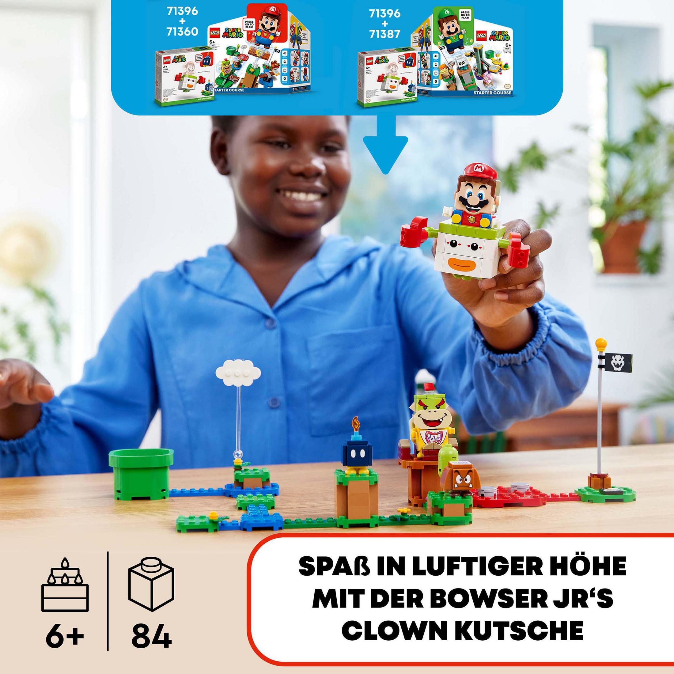 Junge spielt mit Lego-Set. Bowser Jr. in seinem Clown-Auto ist der Hauptfokus.
