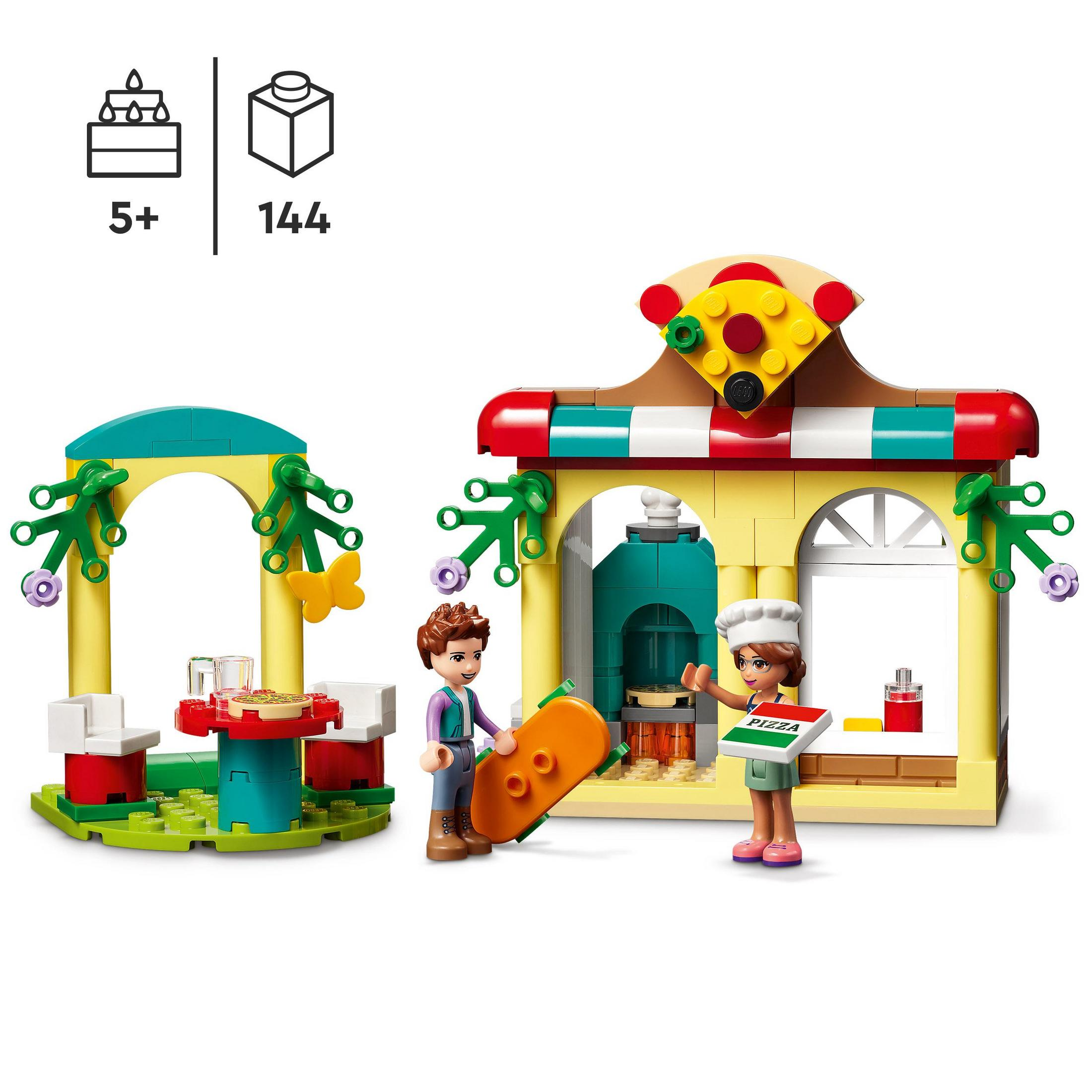 Ein Lego-Set mit zwei Figuren, einem Pizzastand und einer gazeboartigen Struktur.