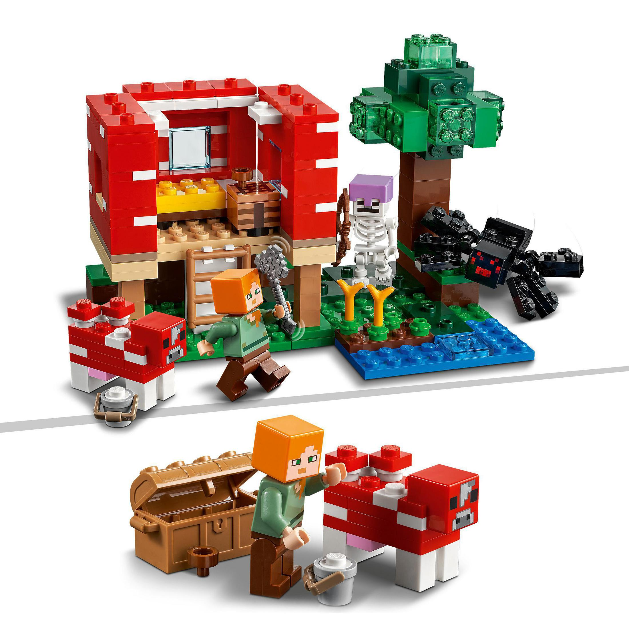 Kırmızı bir ev, karakterler, bir ağaç ve bir sandık içeren Lego Minecraft seti. Sahne dışarıda.