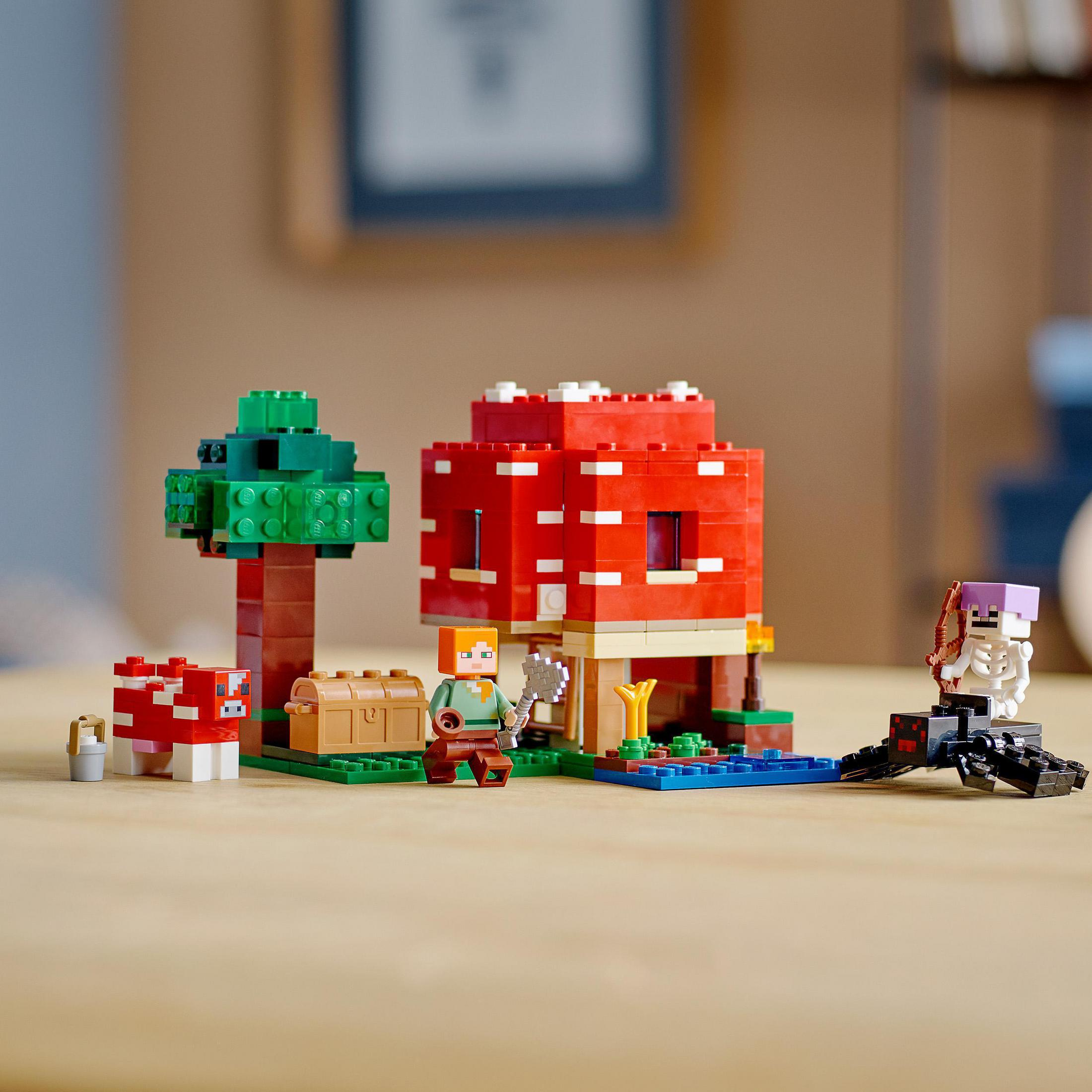 Figürler, ağaç ve su alanı ile Lego Minecraft mantar evi.