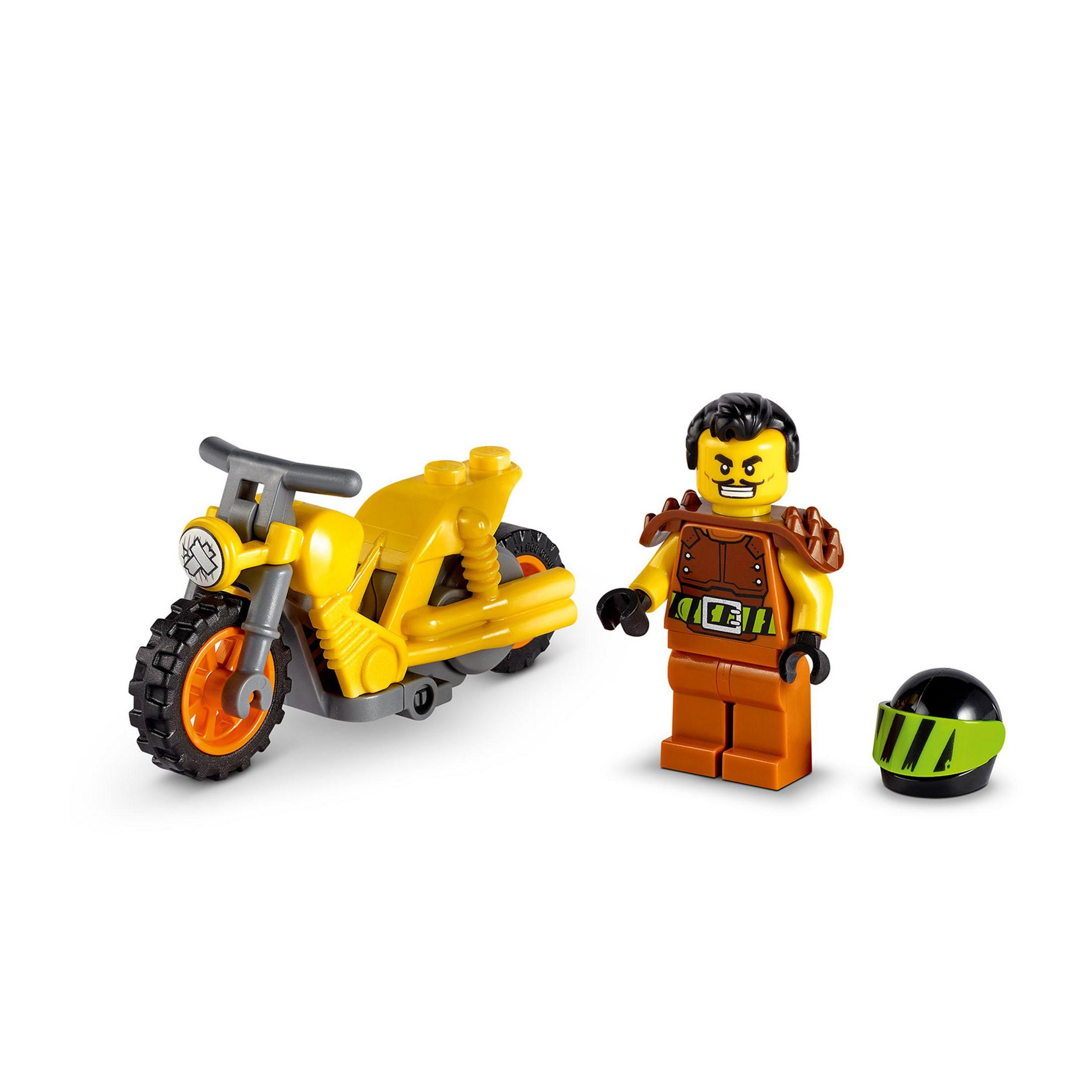 Lego-Minifigur und Motorrad. Gelbes Motorrad, braune und orange Figur und schwarzer Helm.