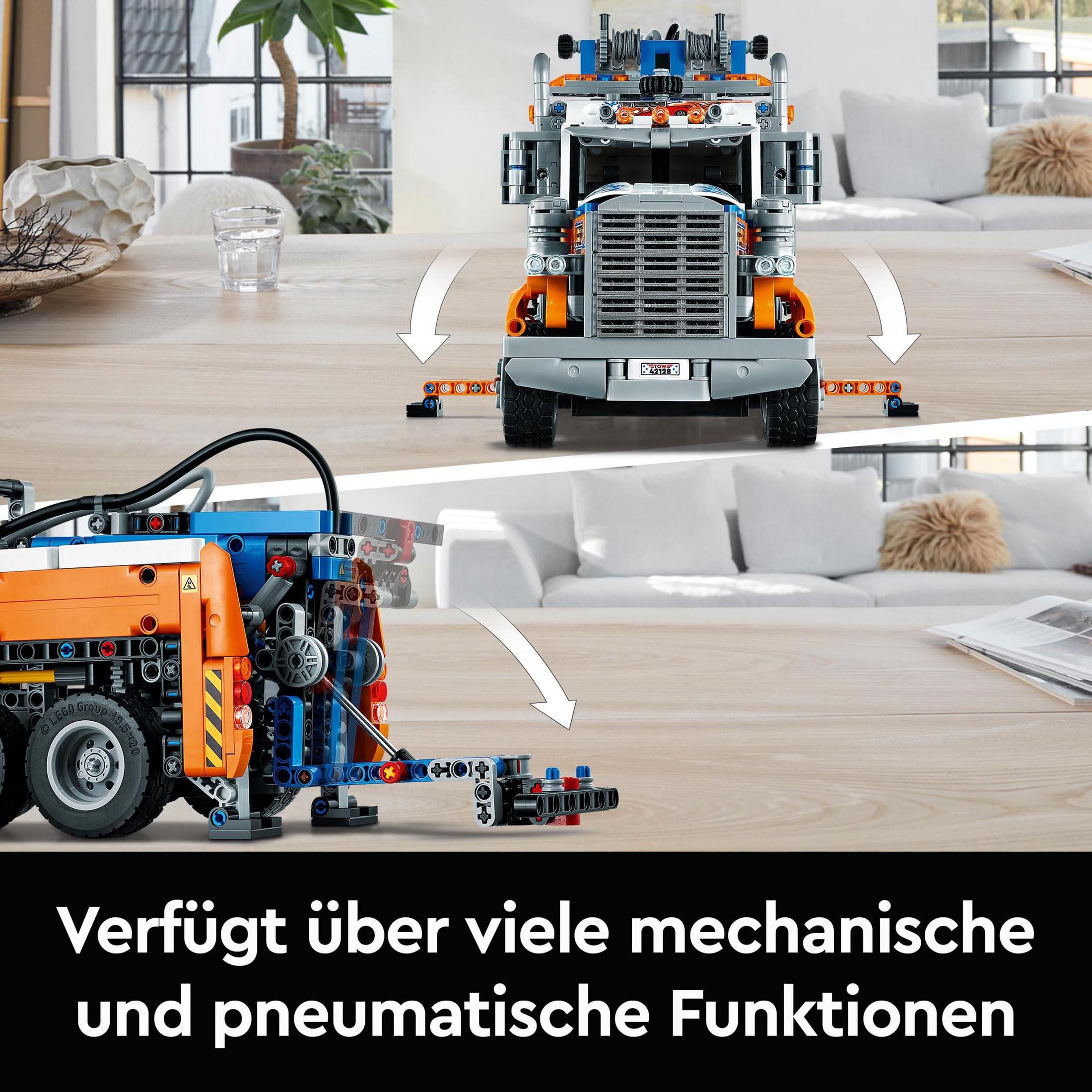 Ciężarówka LEGO Technic, z białymi strzałkami wskazującymi funkcje mechaniczne i pneumatyczne, na drewnianym stole.