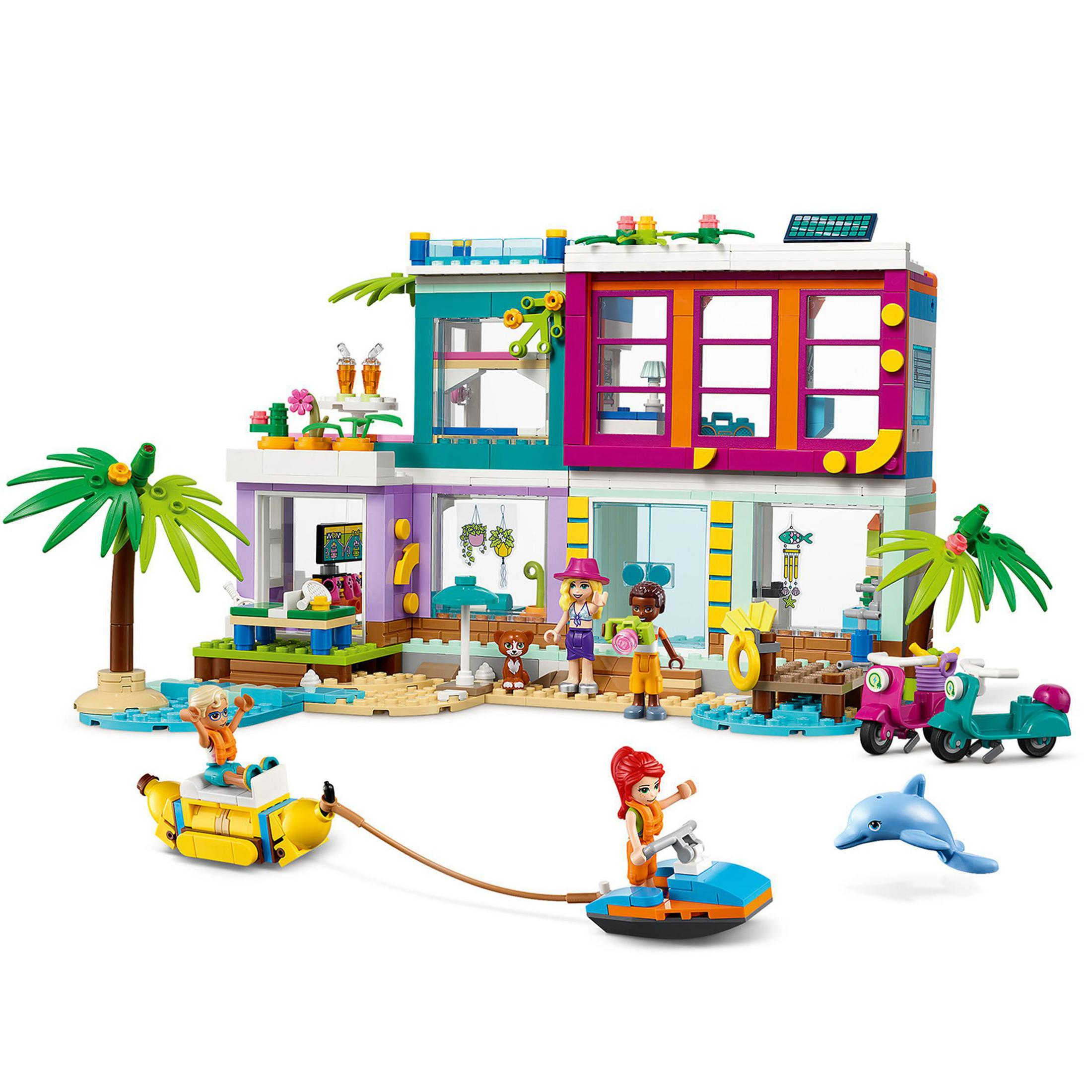 Lego Friends strandhuis set met figuren, een jetski en een dolfijn.