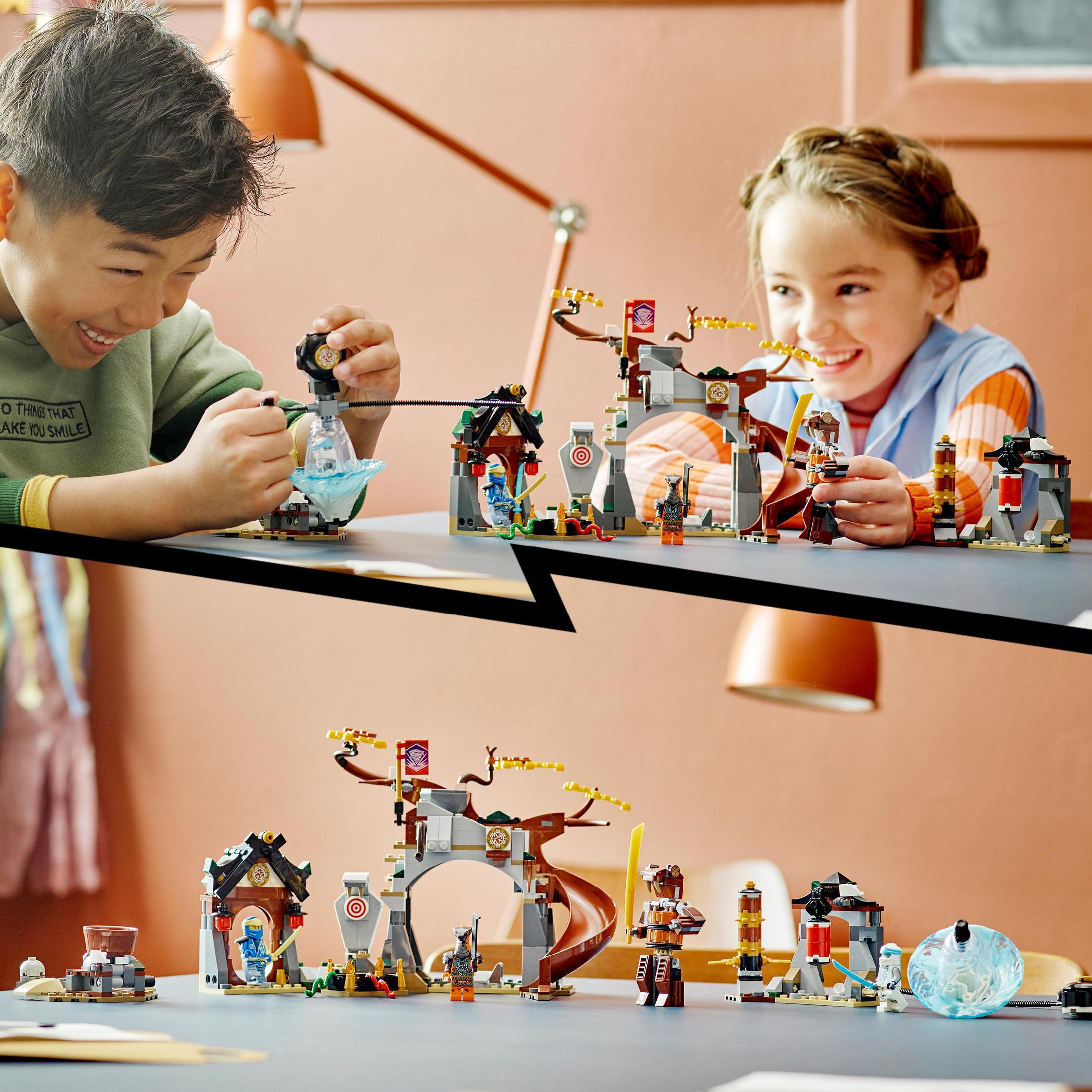 Two children playing with Lego sets. One set of ninja toys. The other, a round blue toy.