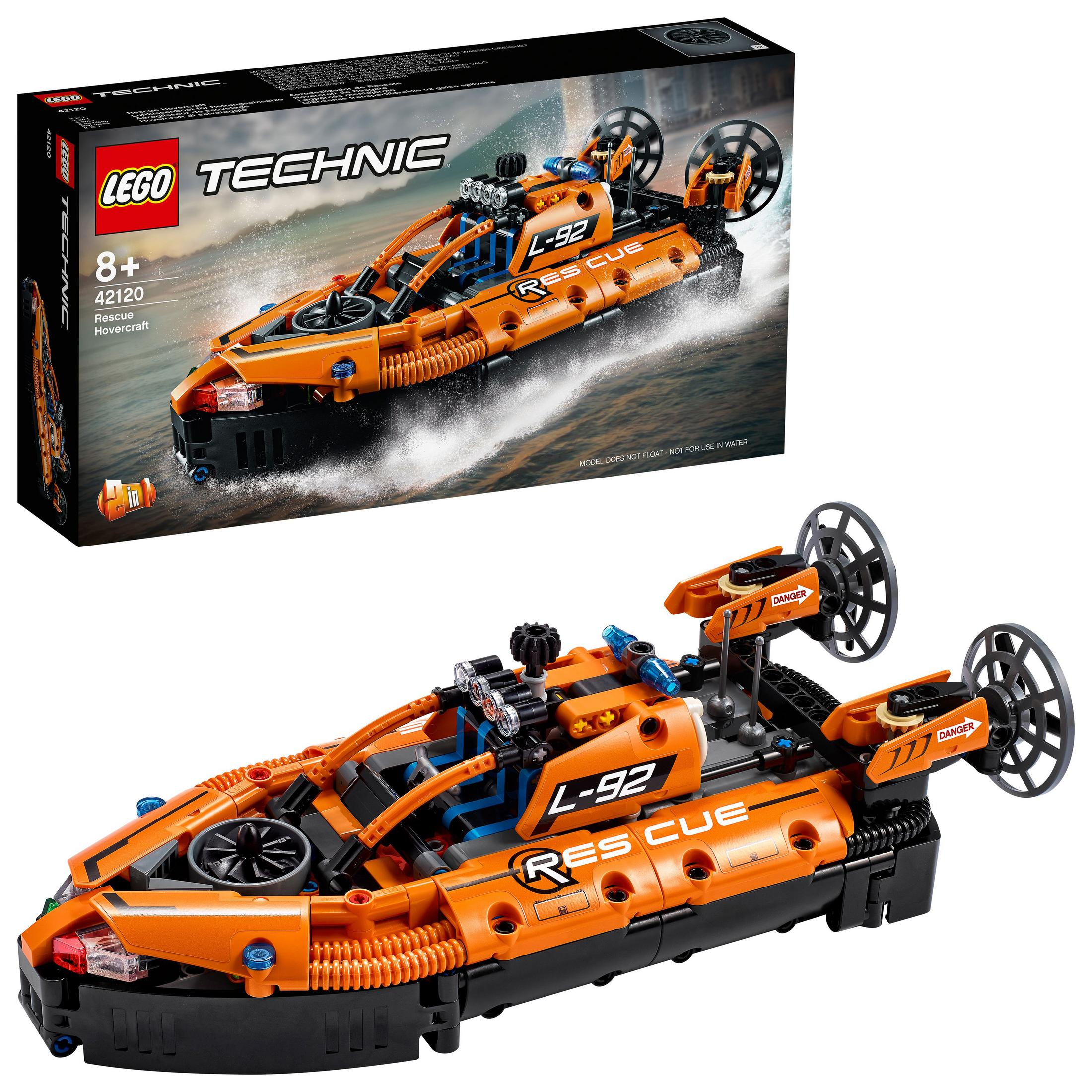 Lego Technic Rescue Hovercraft Spielzeug. Orange und schwarz, mit Propellern und Karton im Hintergrund.