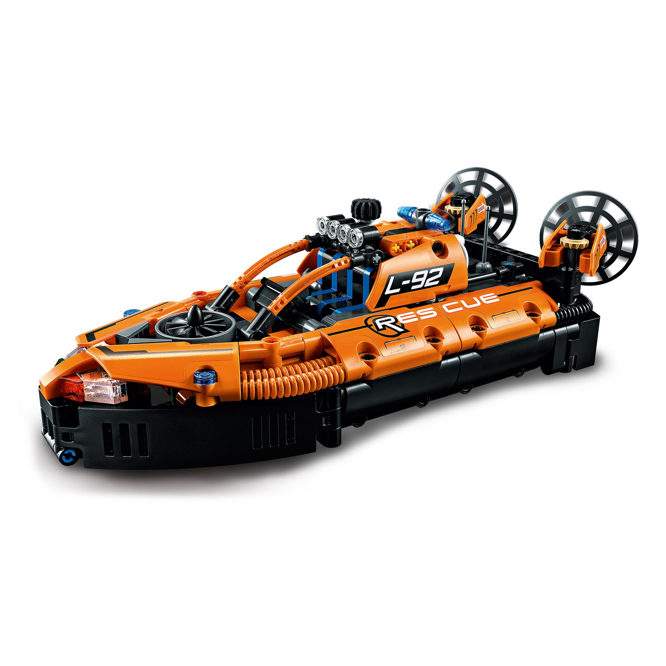 Ein orangefarbenes und schwarzes LEGO-Luftkissenboot-Spielzeug mit zwei Propellern und einer Fahrerkabine.