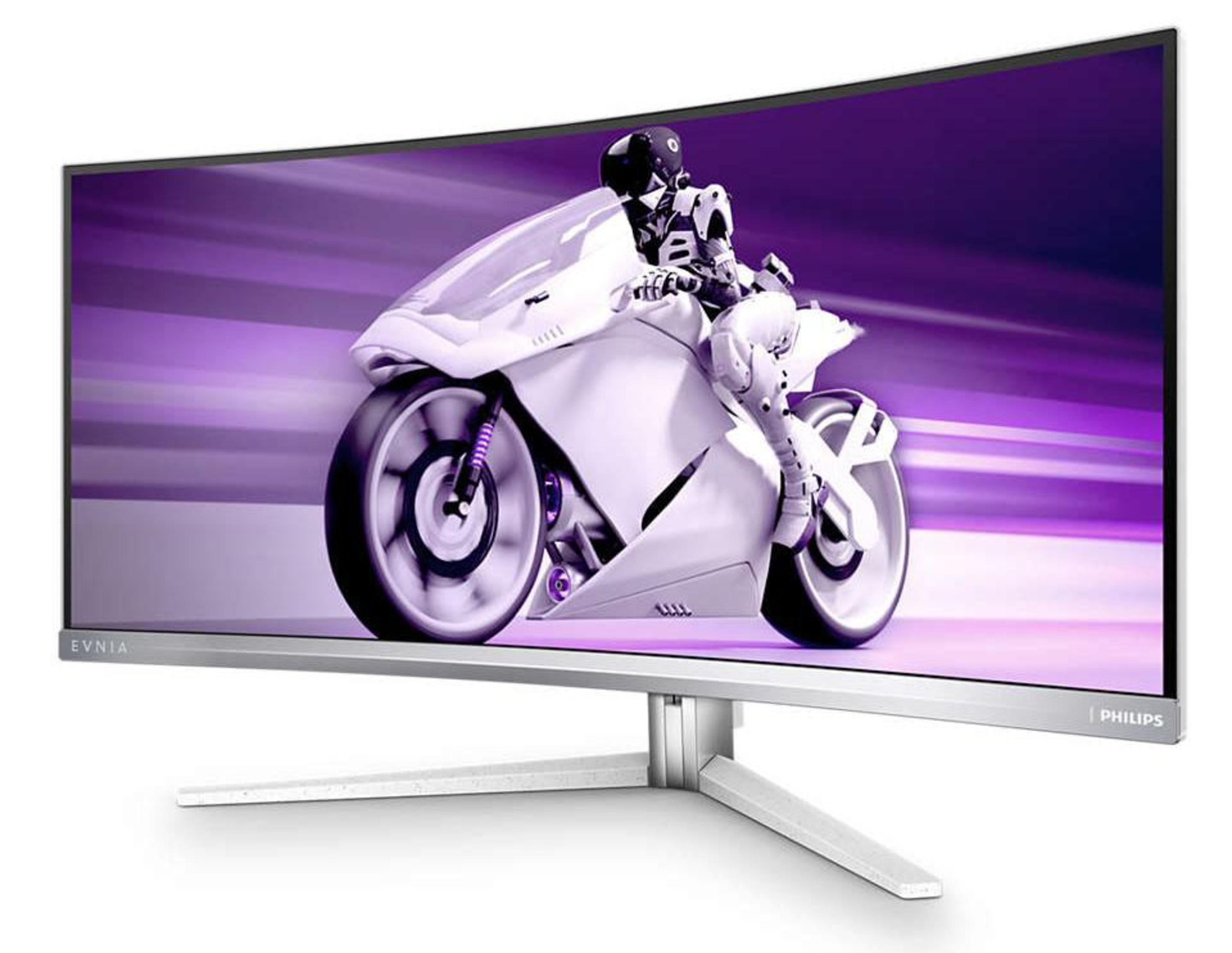 Zakrzywiony monitor komputera. Wyświetla robota na motocyklu na fioletowym tle.