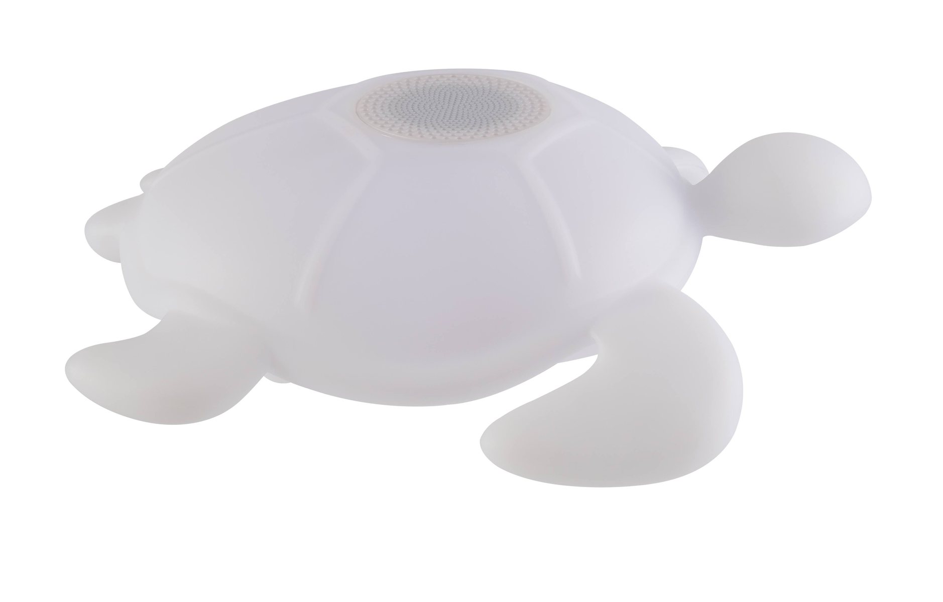 Biały głośnik w kształcie żółwia z kratką głośnika na skorupie. Żółw leży na białej powierzchni.