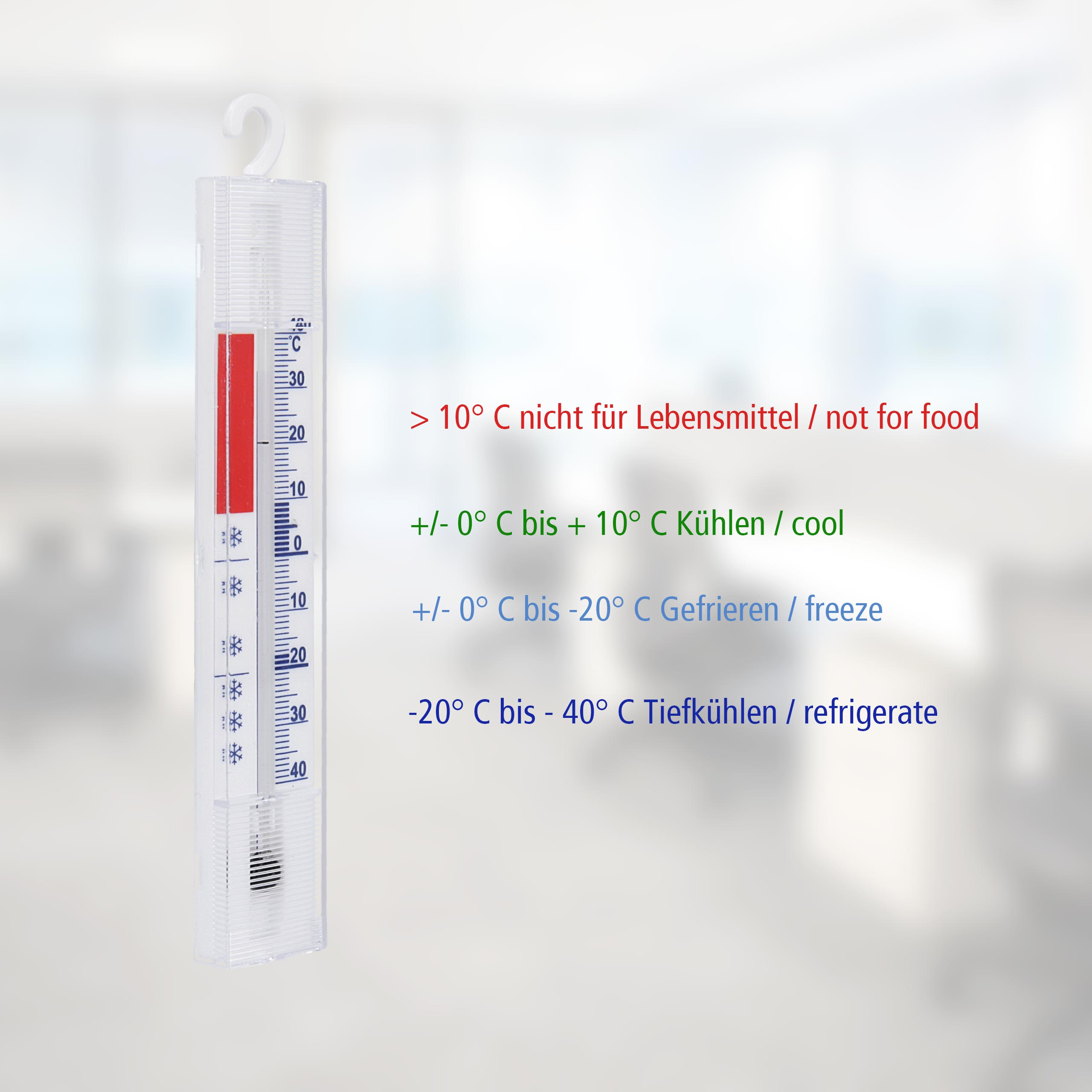 Thermometer mit roter Flüssigkeit und Temperaturmarkierungen, mit Text.