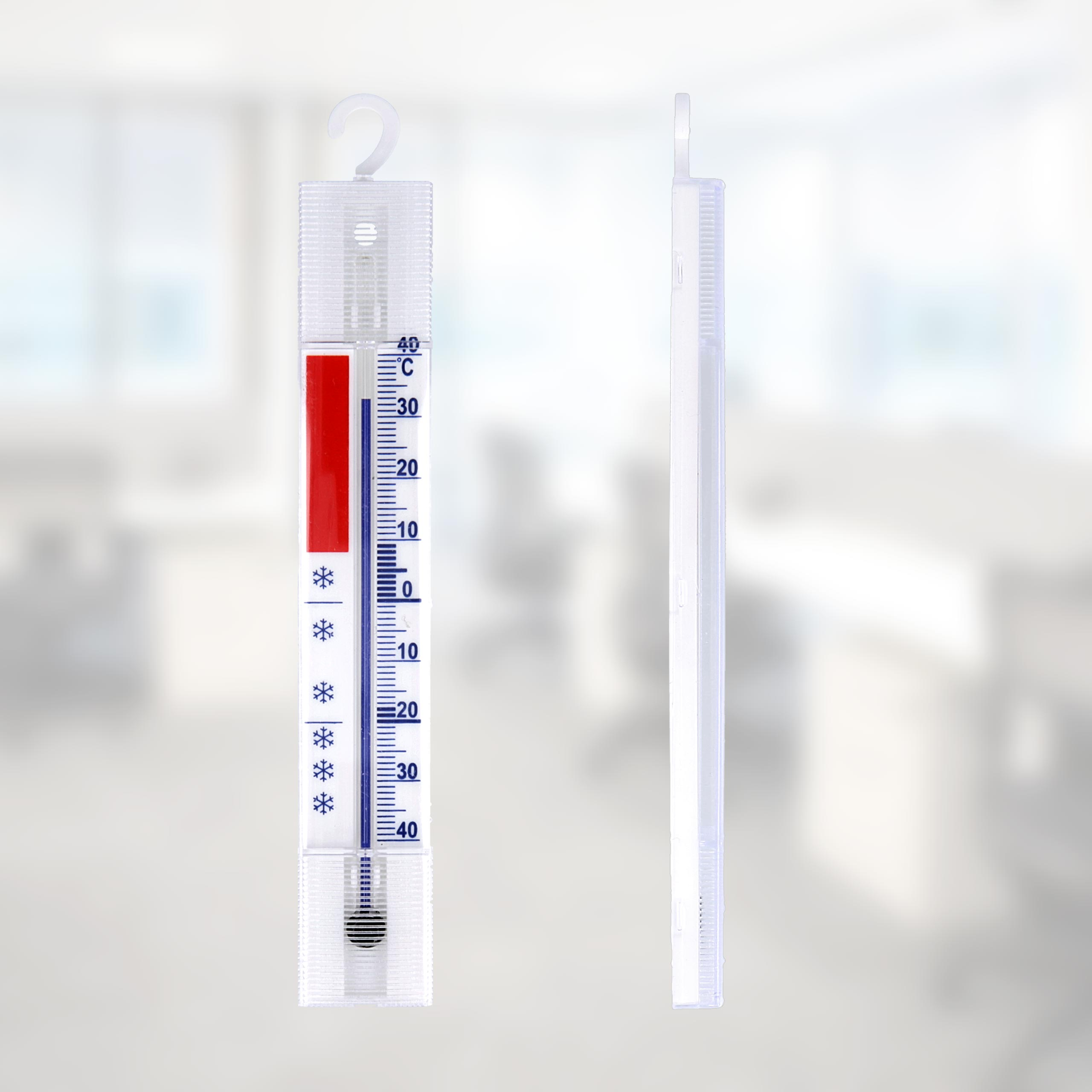Zwei Thermometer, eines zeigt die Temperatur. Ein Thermometer ist vorne, das andere hinten, im Büro.
